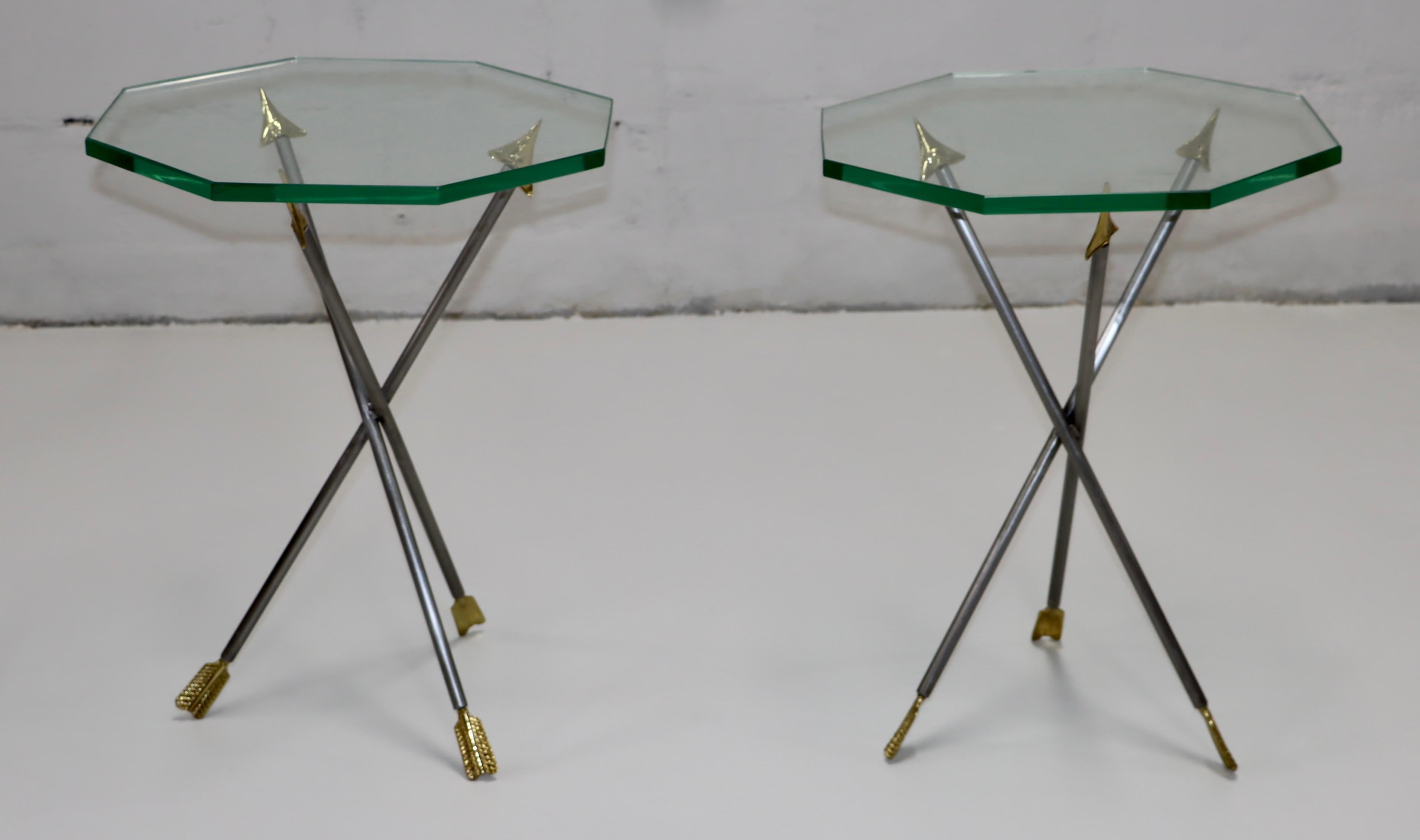 1970's Mid-Century Modern steel and brass arrow base side tables with octagonal 3/4'' glass tops, in vintage original condition with some wear and patina due to age and use.