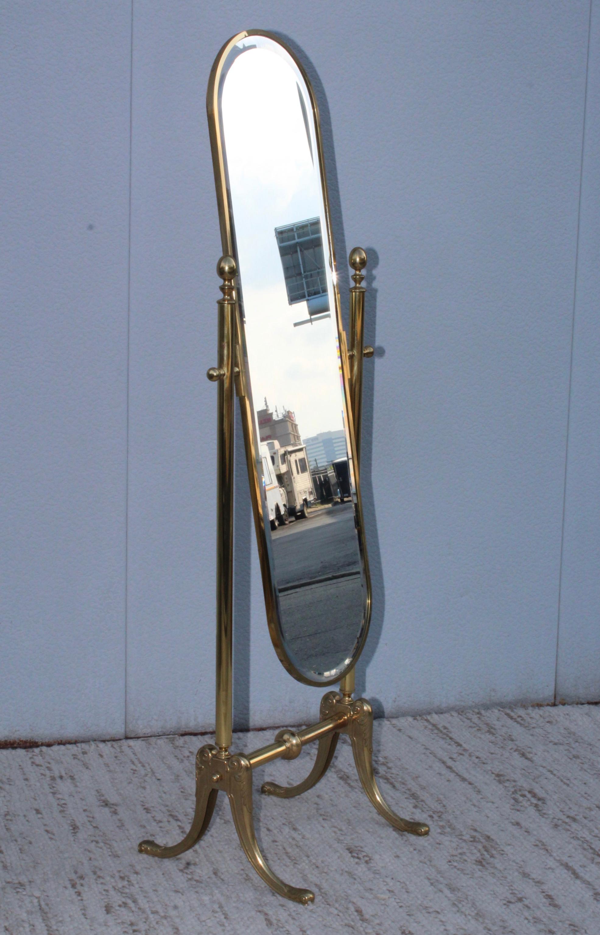 1970s Italian full length cheval brass oval mirror. In vintage original condition, with some wear and patina to the brass.