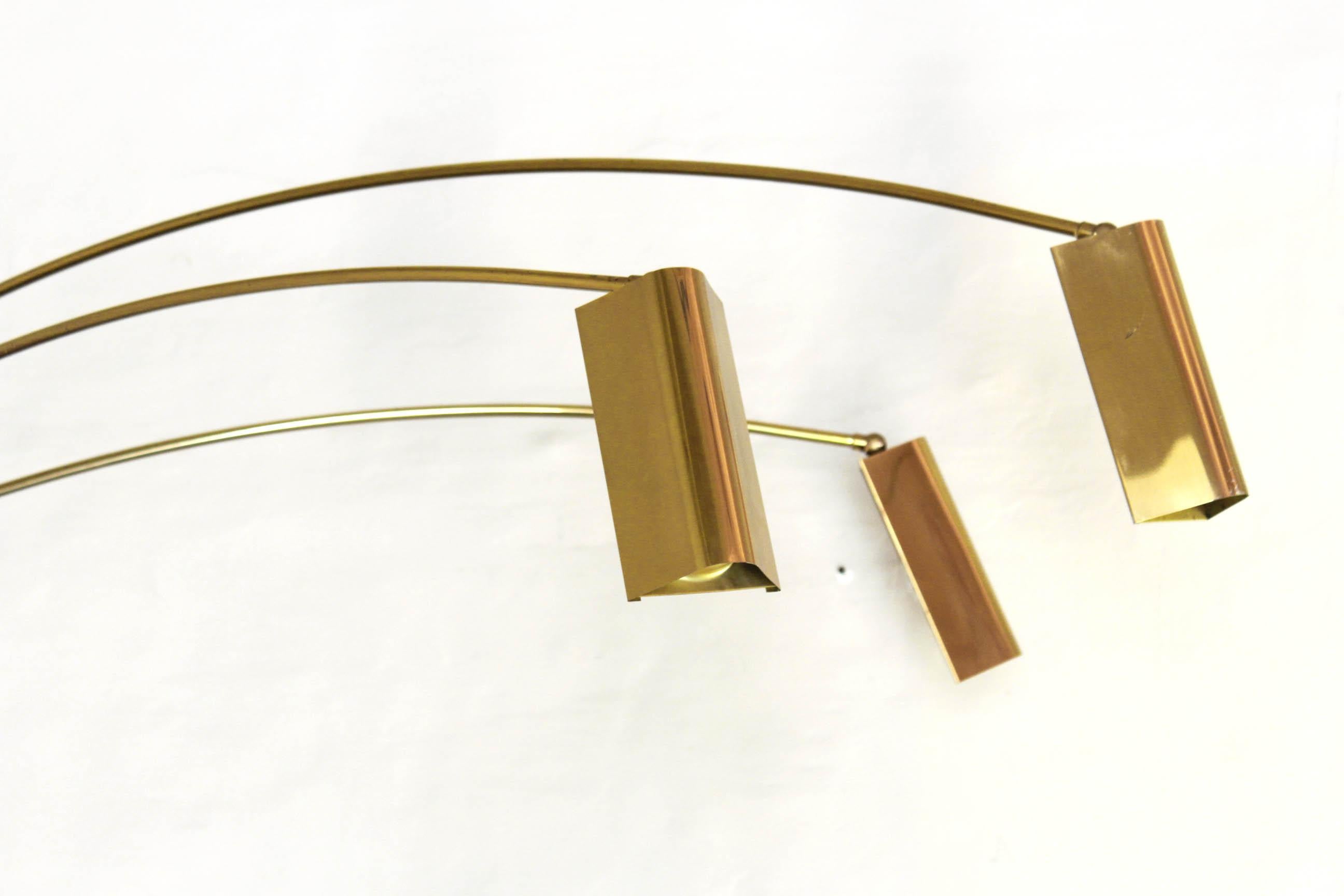 Vintage brass Floor Lamp, Italy 1970s
A late 1970s floor lamps with 3-light set on 3 different moving arms. The item is in excellent conditions with only few signs of time on the brass.