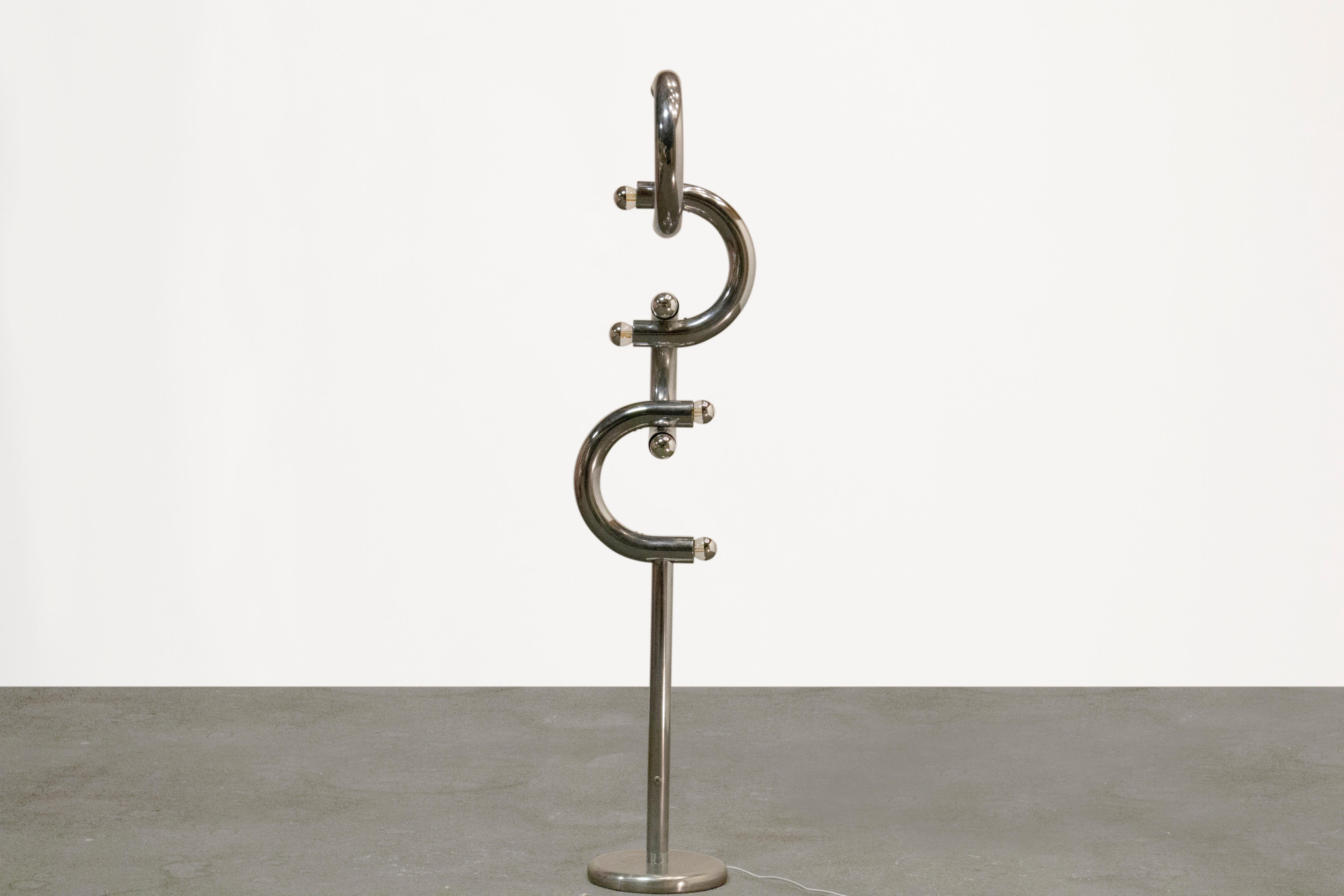 Step back in time and immerse yourself in the allure of the 1970s with this remarkable Italian Chain Floor Lamp by renowned designer Carlo Nason for Stilux. Standing at an impressive height of 144cm (56.7 inches) and with a width of 35cm (13.8