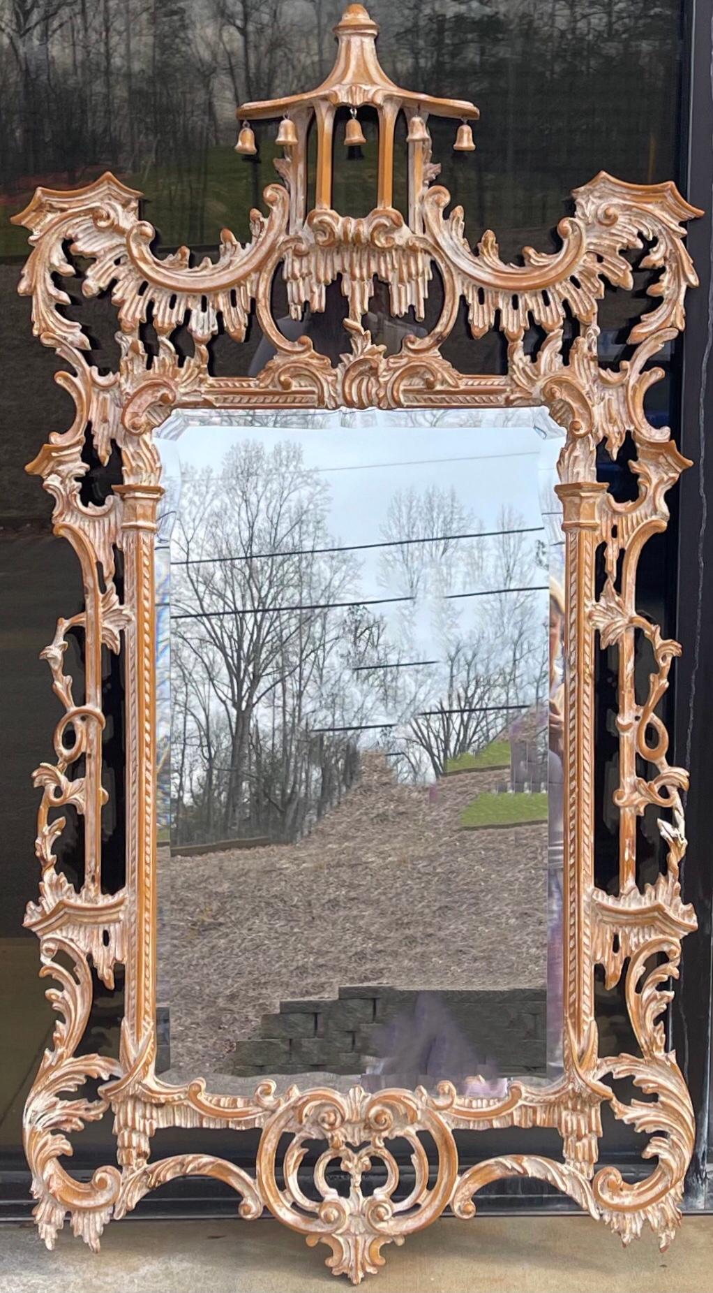 This is a 1970s Italian carved and cerused pine Chinese chippendale style mirror. Love the pagoda! It is marked and in very good condition. Classic styling with a twist!