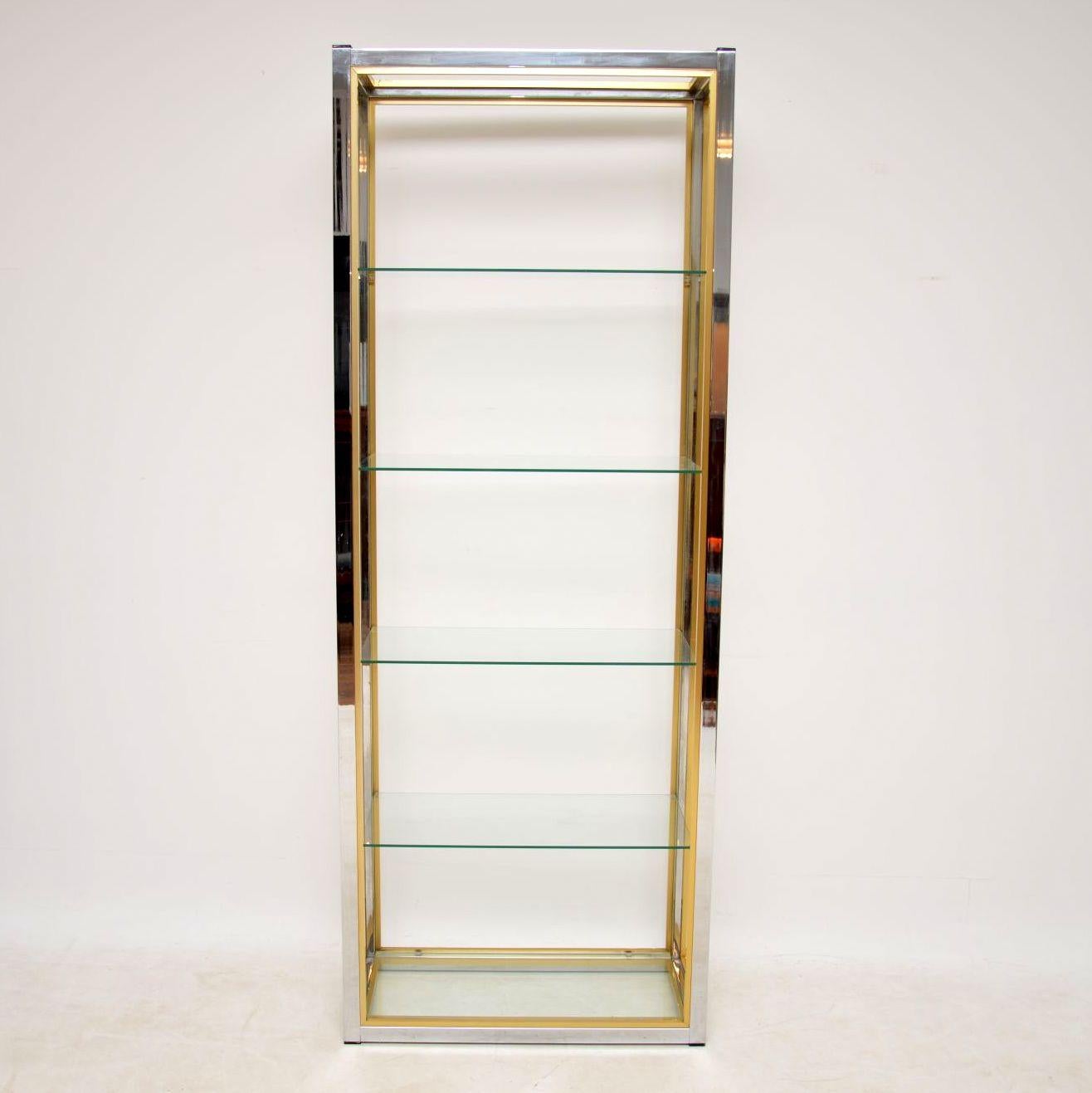 A beautiful vintage display case by Zevi, this was made in Italy in the 1970s. These were originally retailed by Harrods, this one is predominantly chrome, with brass plated aluminium trim. The condition is very good for its age, with only some very