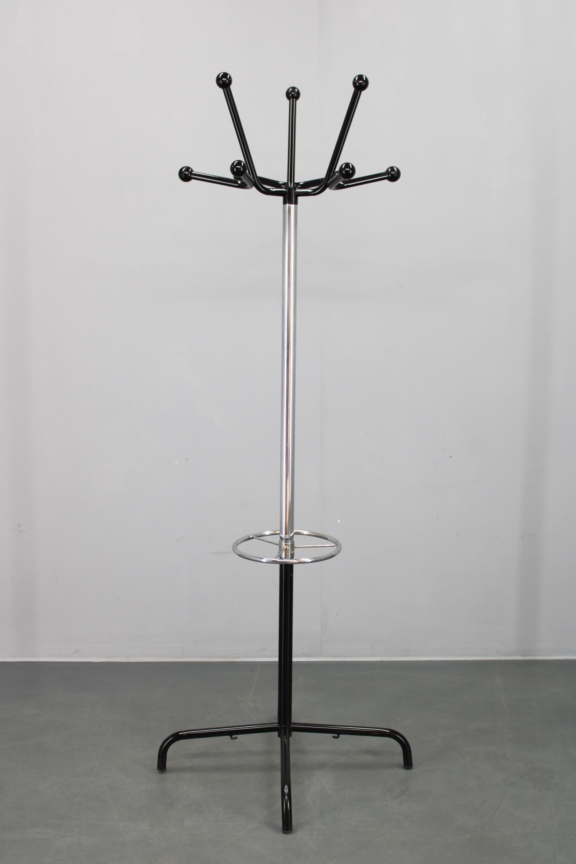 Coat rack made in Italy, 1970s, featuring a dynamic design with chrome-plated and lacquered iron construction complemented by playful plastic ball hooks. A sculptural blend of functional minimalism and retro flair, suitable for entryways or