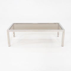 Mesa de centro italiana de los años 70 en acero cromado y cristal ahumado attr. a Nanda Vigo