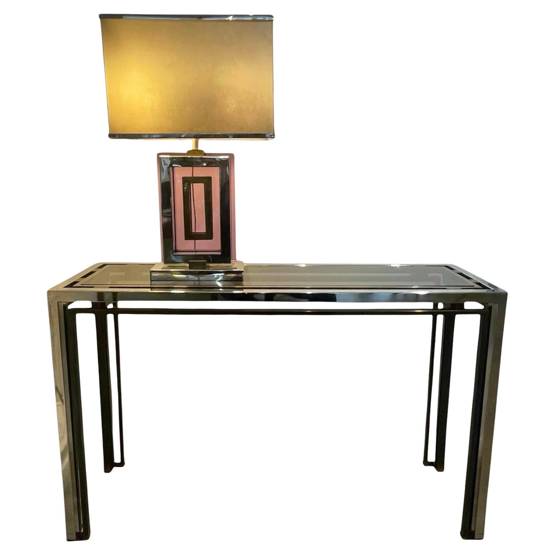 Consola italiana de los años 70 diseñada por Romeo Rega, metacrilato, cromo y cristal.