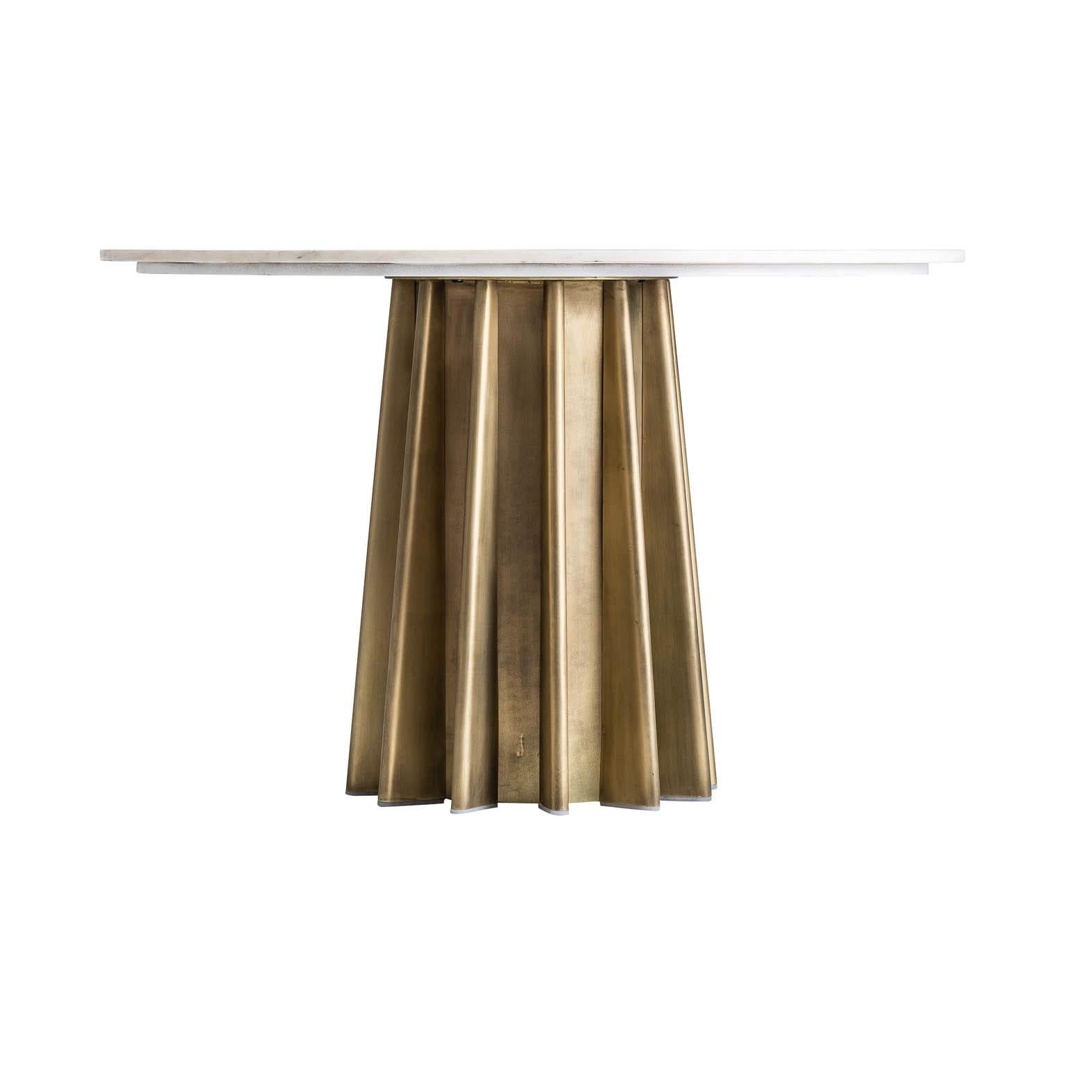 Italian design style round pedestal table consisting of a graphic gilded metal foot with a round white marble tray.