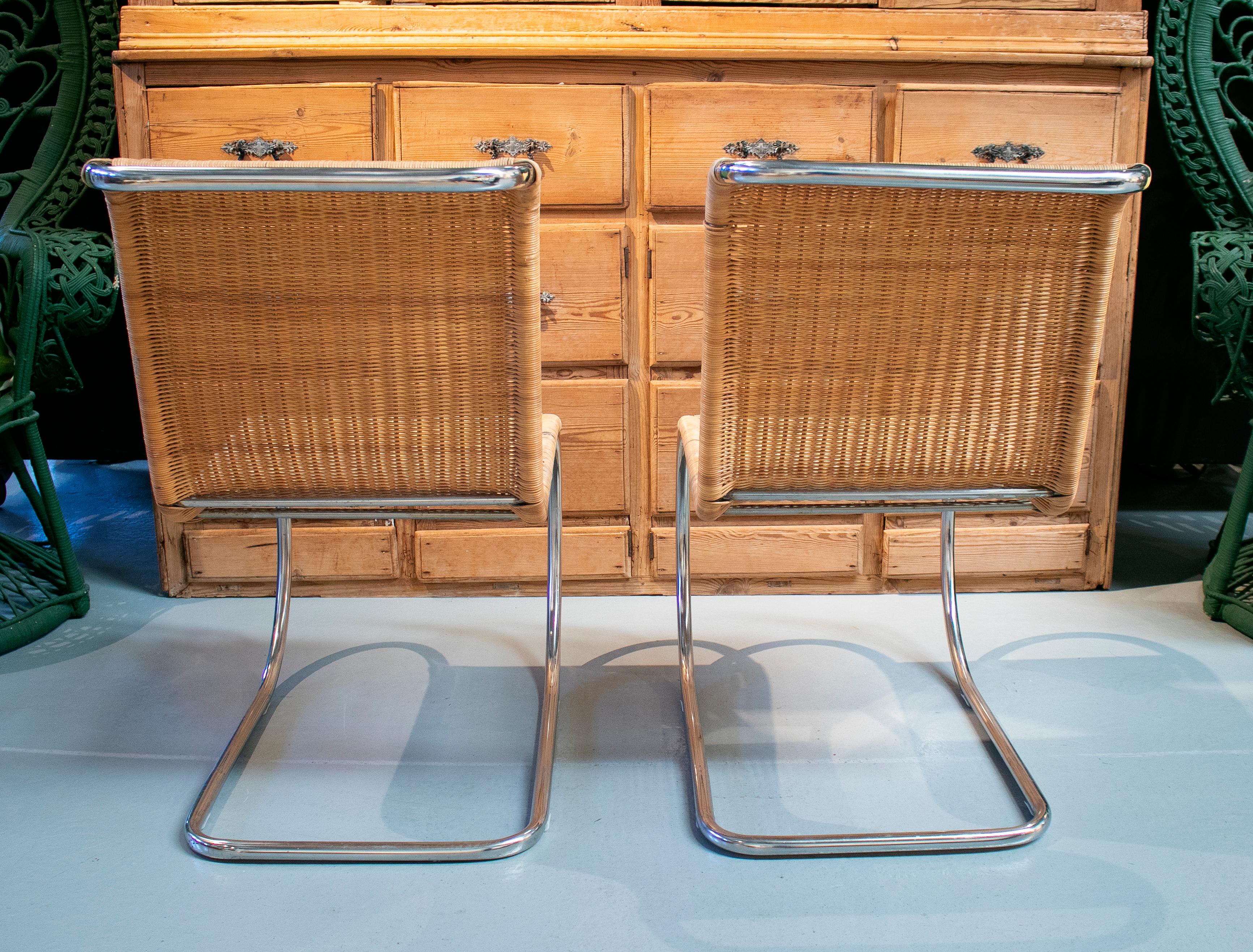 Stainless Steel 1970s Italian Designer Chairs with Steel Structure and Weaved Rattan