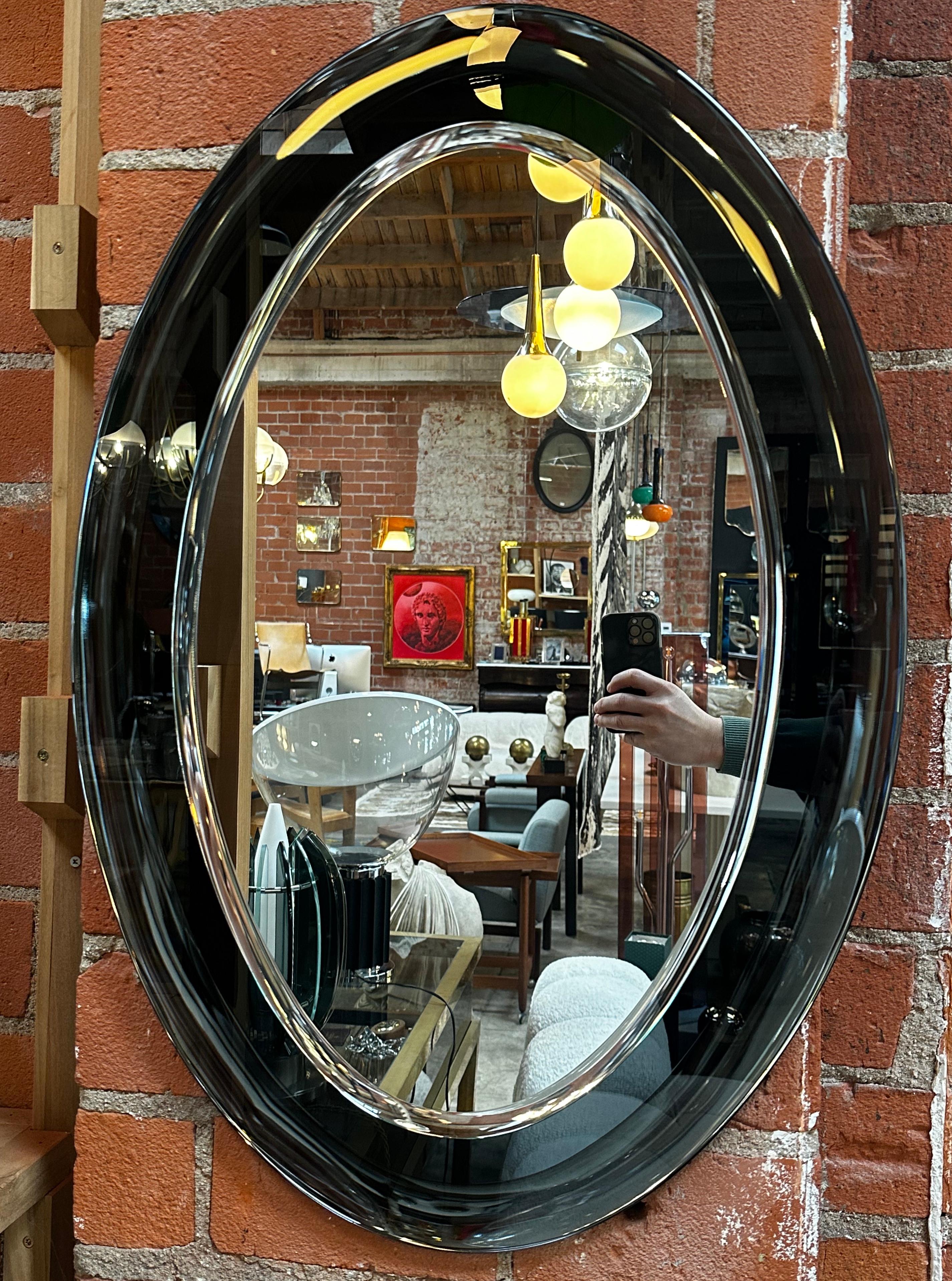Beautiful double glass wall mirror made in Italy 1970s. Original Patina.
    