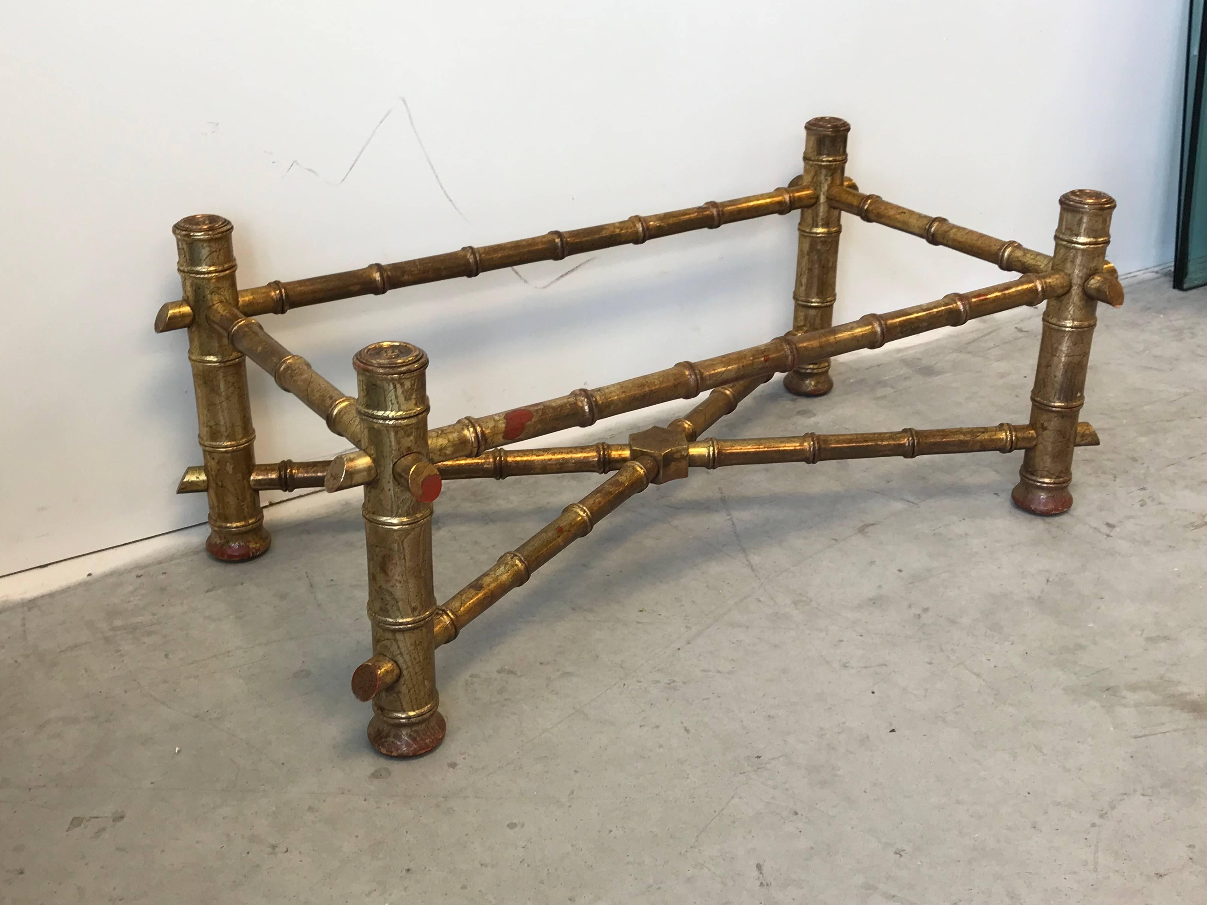 Listed is a stunning, 1970s Italian Florentine, faux-bamboo gilded coffee table. The piece can take a minimum glass top of 38.5in x 20.5in. This item does not include glass top. Price reflects base without top.