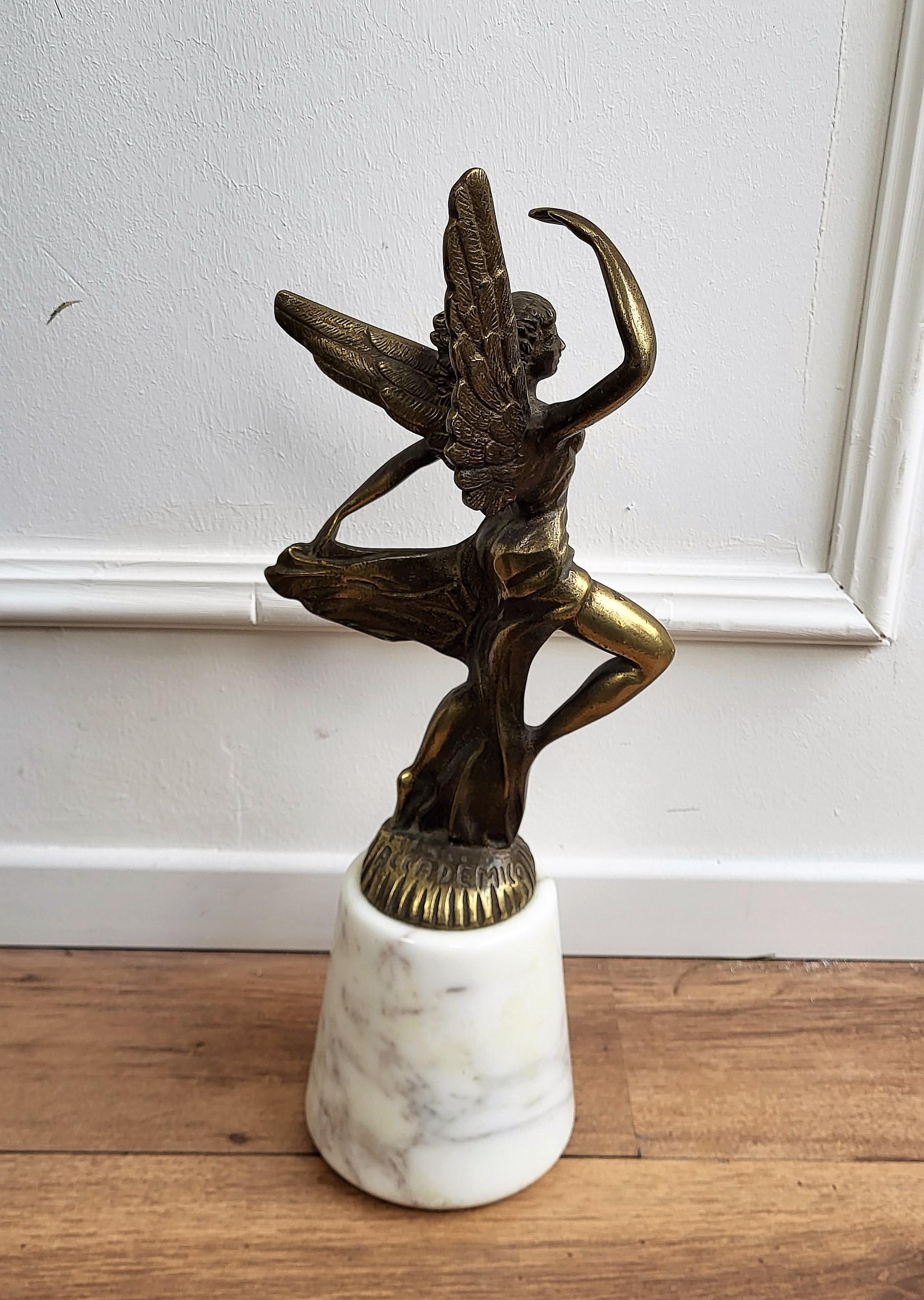 1970s Italian Gilt Brass and White Marble Sculpture Trophy Door Stop or Bookend In Good Condition In Carimate, Como