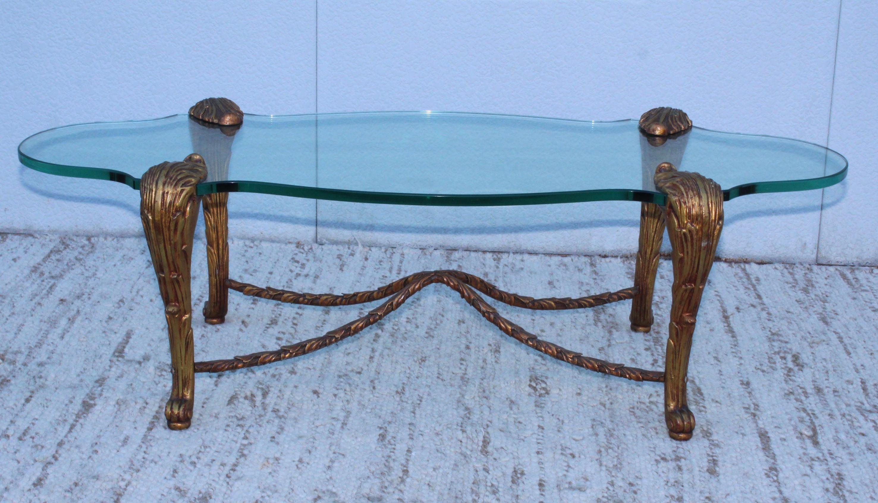 1970s cast iron gilded Italian coffee table with 3/4 thick glass.