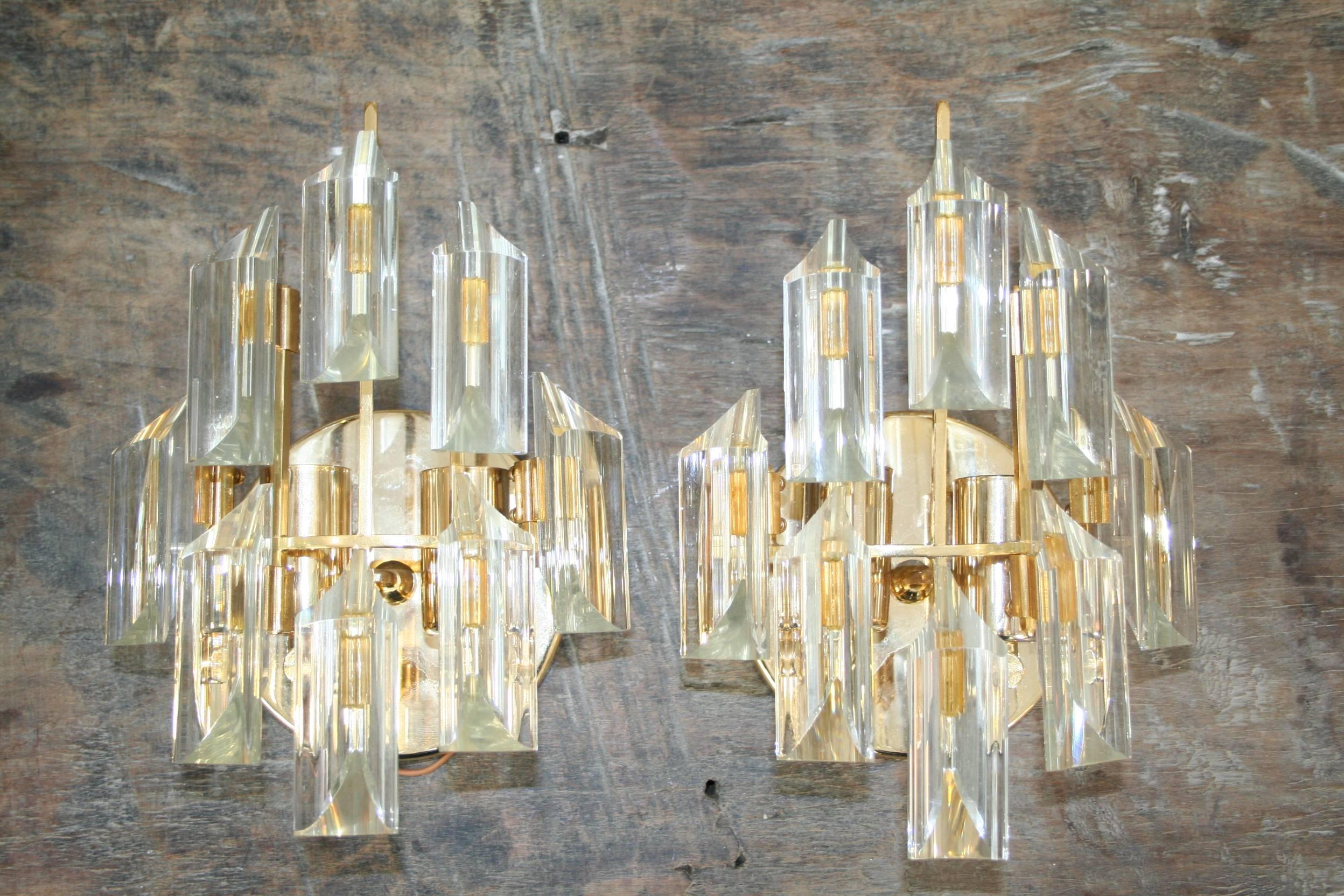 1970s Italian glass and metalled sconces. Each of them with eight pieces of glass and two lights.