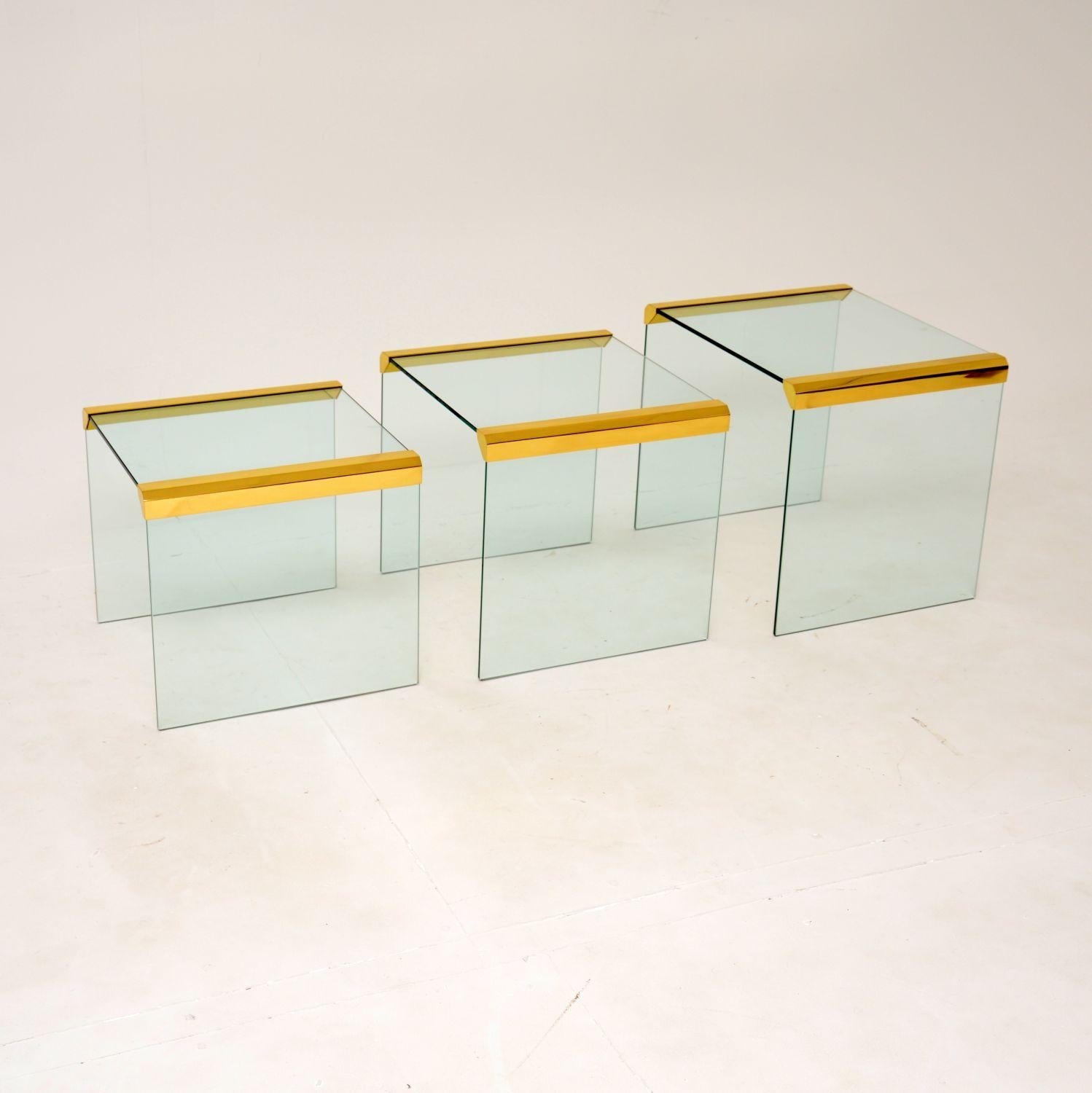 A stunning vintage nest of tables in thick toughened glass and brass. Designed by Pierangelo Gallotti for Gallotti and Radice, they were made in Italy in the 1970’s.

The quality is exceptional, they are beautifully made and in superb condition
