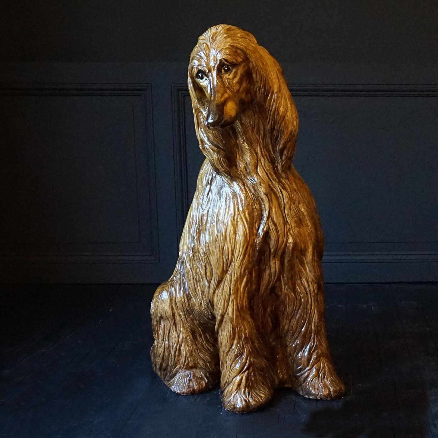 Are you looking for a real eye-catcher in your living room, your hallway or your bedroom?
This life size Italian sitting Afghan hound statue is it.
He is beautifully detailed and hand painted what makes him look very real.

The Afghan Hound is a