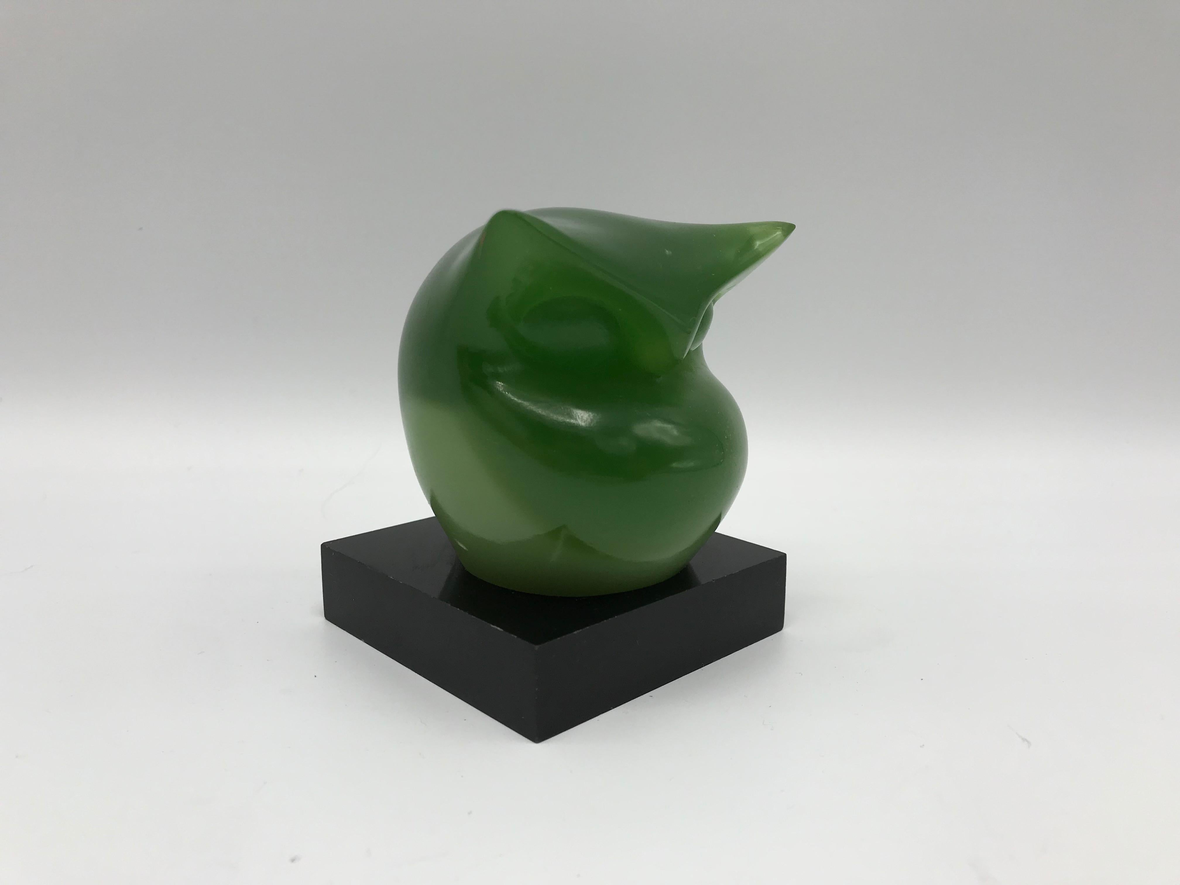 Offered is a fun and modern, 1970s Italian green tinted-resin owl sculpture. Includes original 'Italy' tag on underside, see last photo.