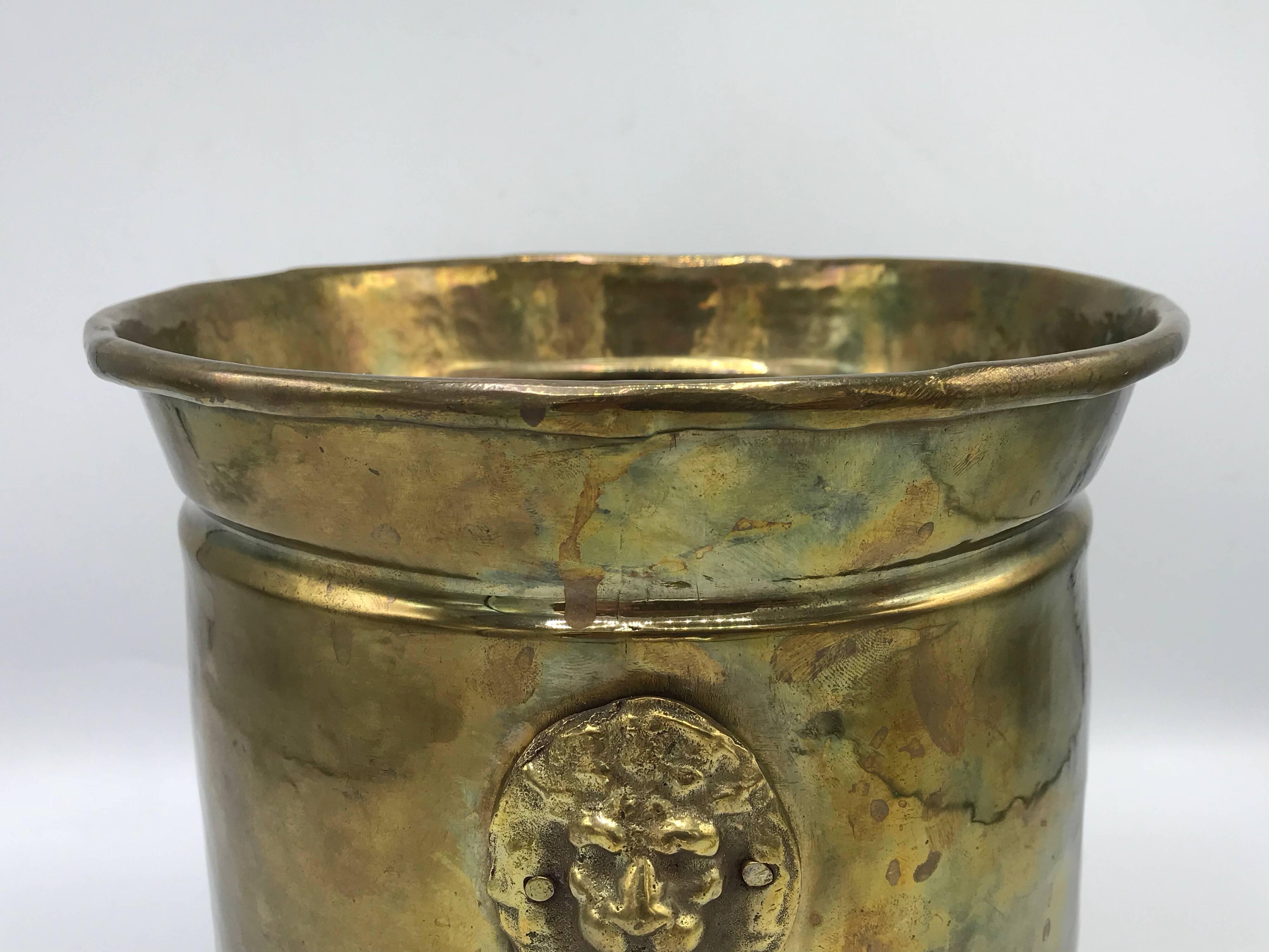 1970s Italian Hammered Brass Cachepot Planter with Lion Head and Foot Motif In Good Condition In Richmond, VA