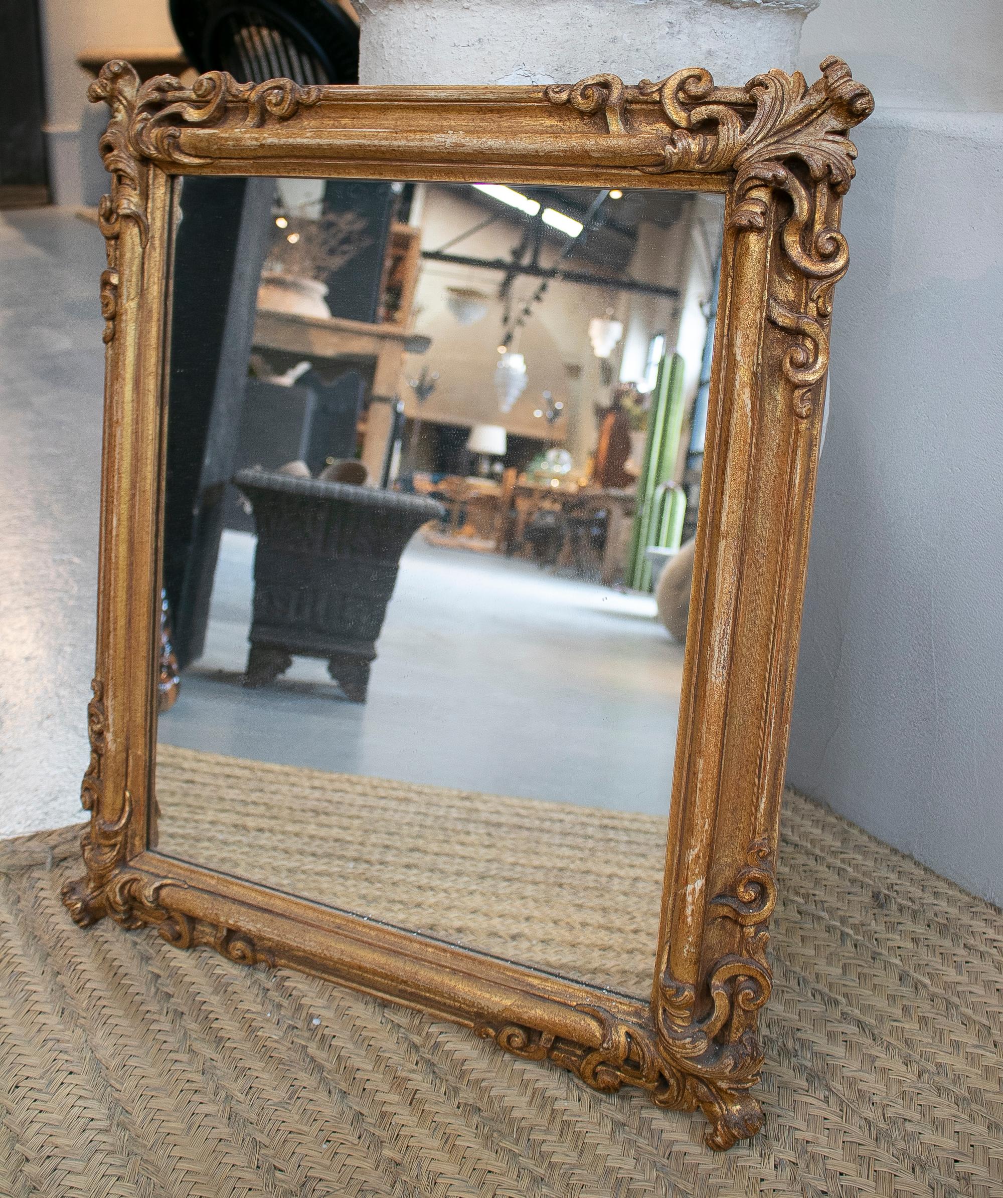 1970s Italian hand carved baroque wooden mirror.