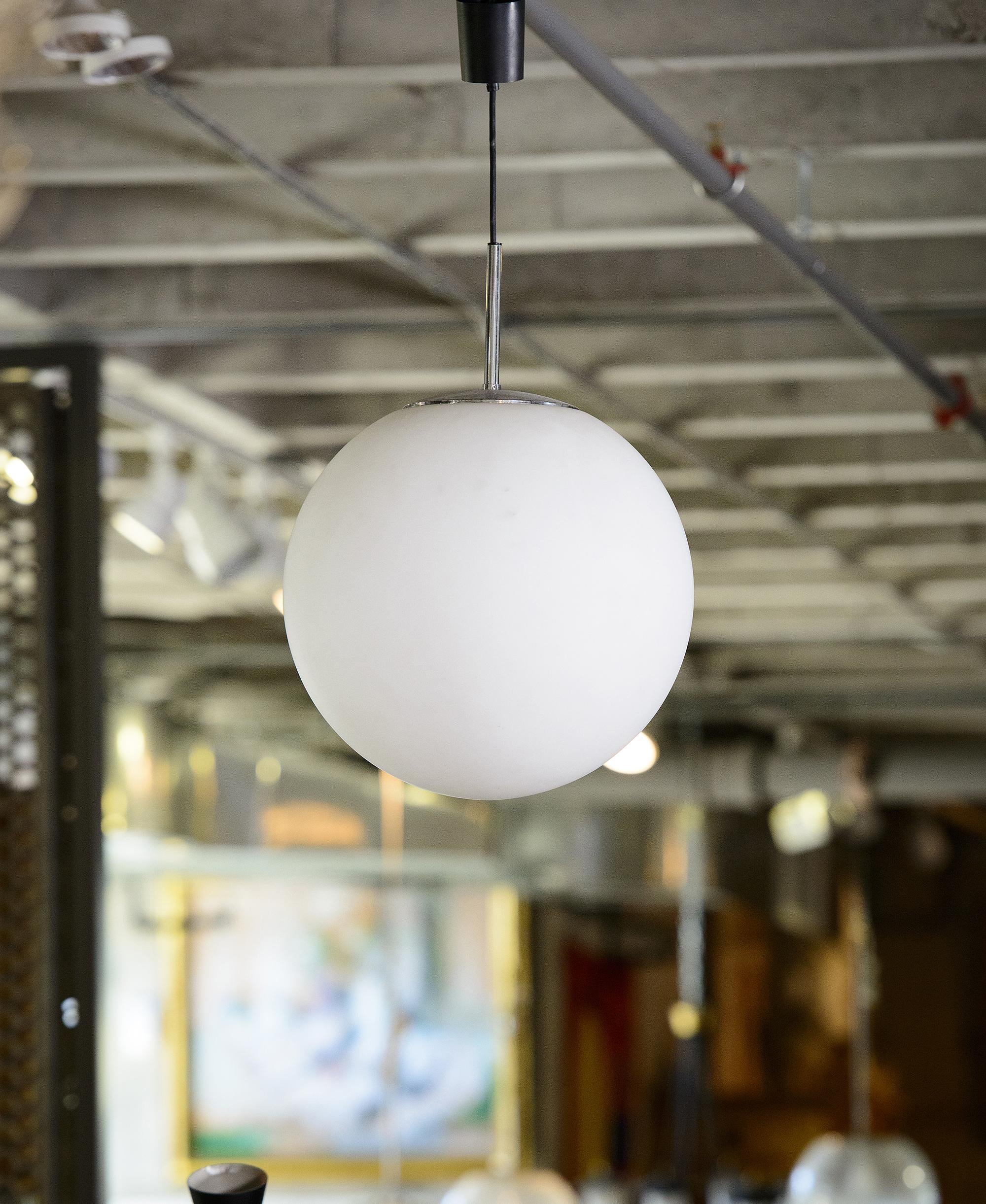 Italian very large single opaline glass ball hanging fixture, 1970s.