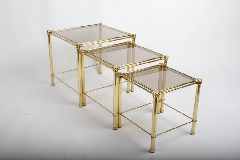 Mid-Century Modern 1970s Italian Hollywood Regency Brass & Bronze Glass Set of 3 Nesting Tables For Sale