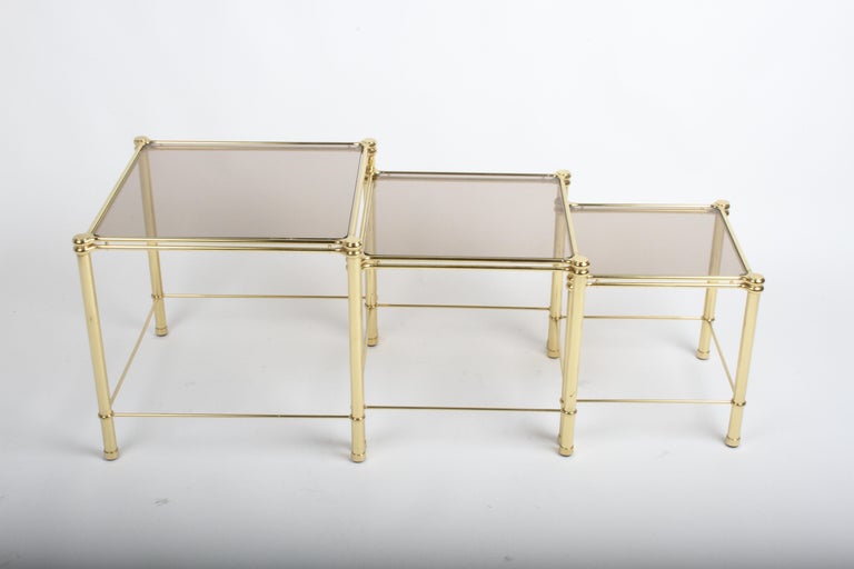 Late 20th Century 1970s Italian Hollywood Regency Brass & Bronze Glass Set of 3 Nesting Tables For Sale