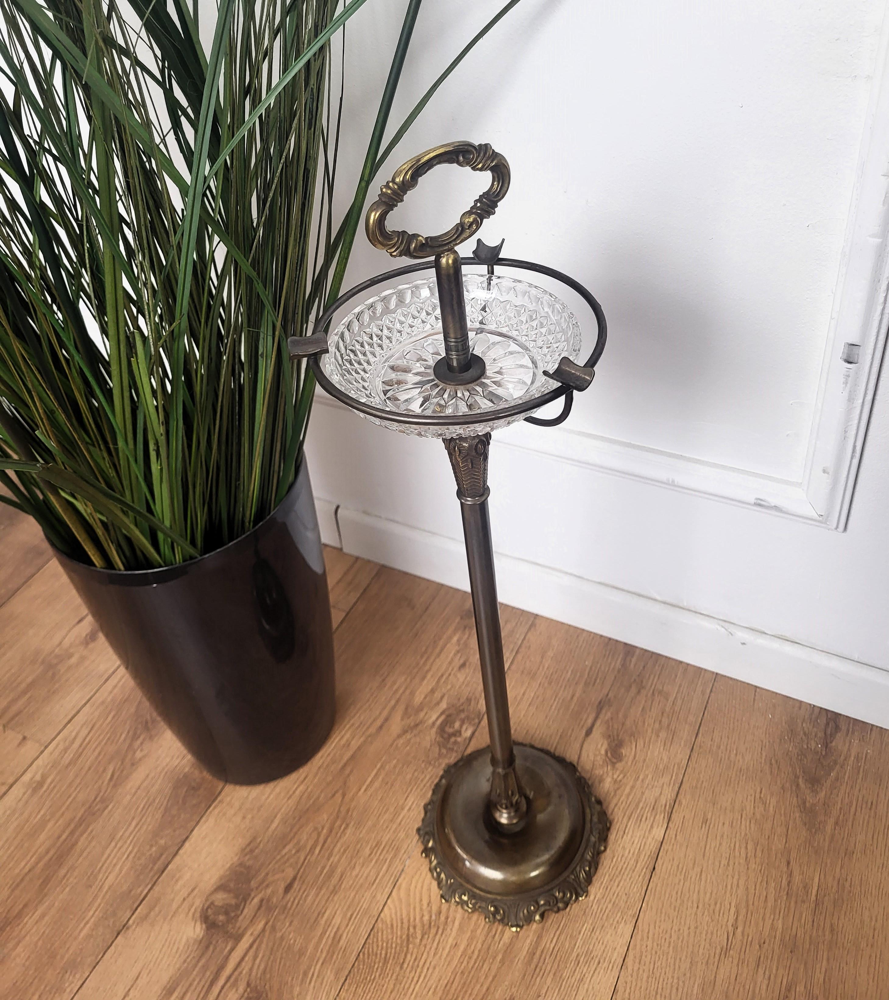 Beautiful brass and glass ashtray stand, manufactured in the 1980s in Italy. The conditions are excellent, with very minor fading and great timeless patina of the gilt brass.

A great piece that perfectly adds to every home decor the typical glitz,