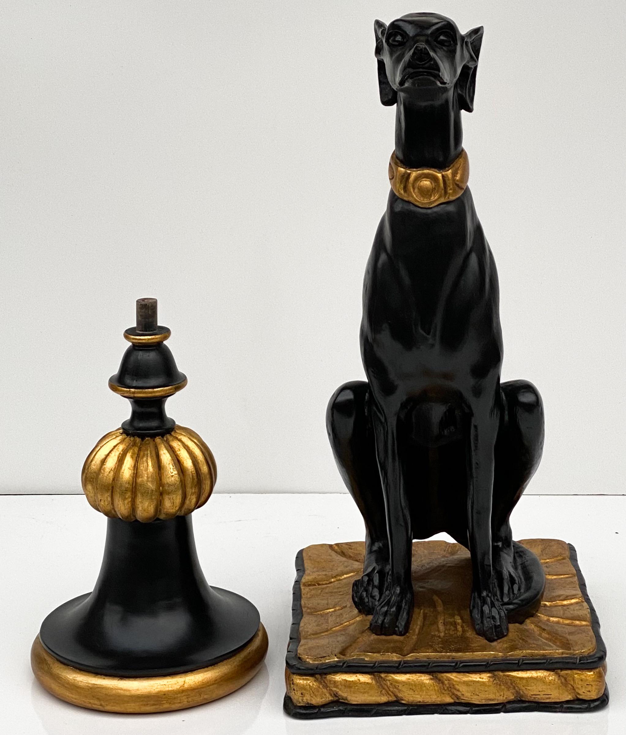This is a gilt and black lacquer Regency style seated greyhound. It has a carved wood removable planter,  but the body is cast resin. The planter is removable. It is unmarked and in very good condition. The planter is attributed to Maitland- Smith.