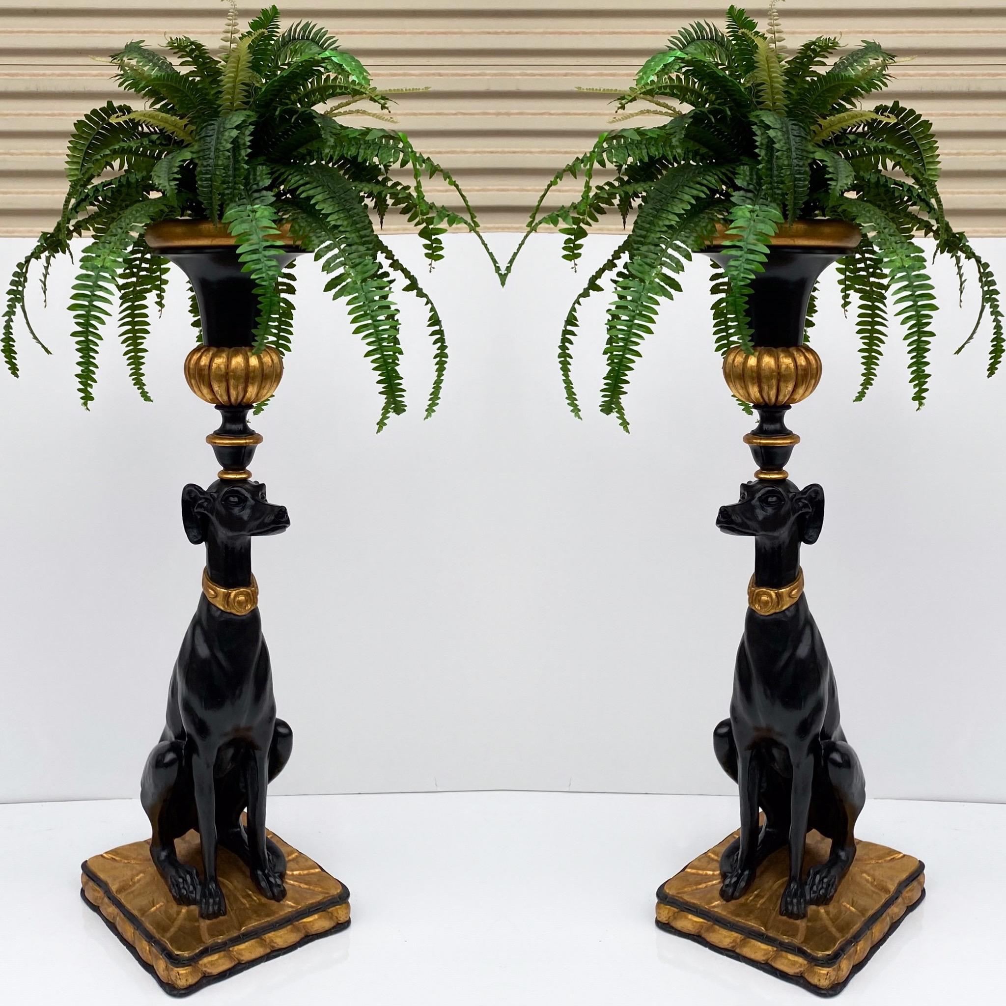 This is a pair of gilt and black lacquer Italian Hollywood Regency style seated greyhounds. They have carved wood removable planters, but the bodies are cast resin. The planter is removable. They are unmarked and in very good condition.