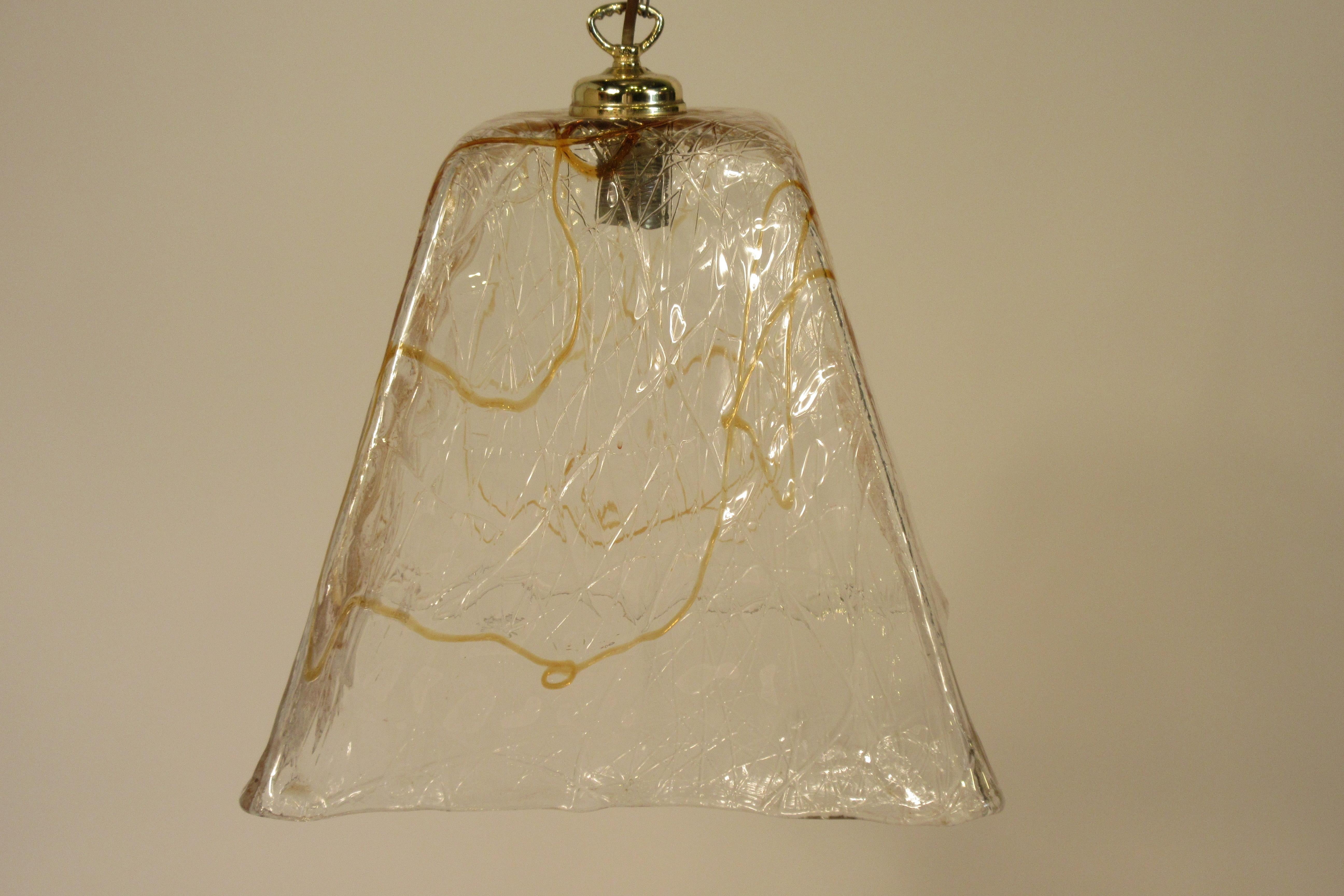 1970s Italian icicle glass fixture with amber streaks.
