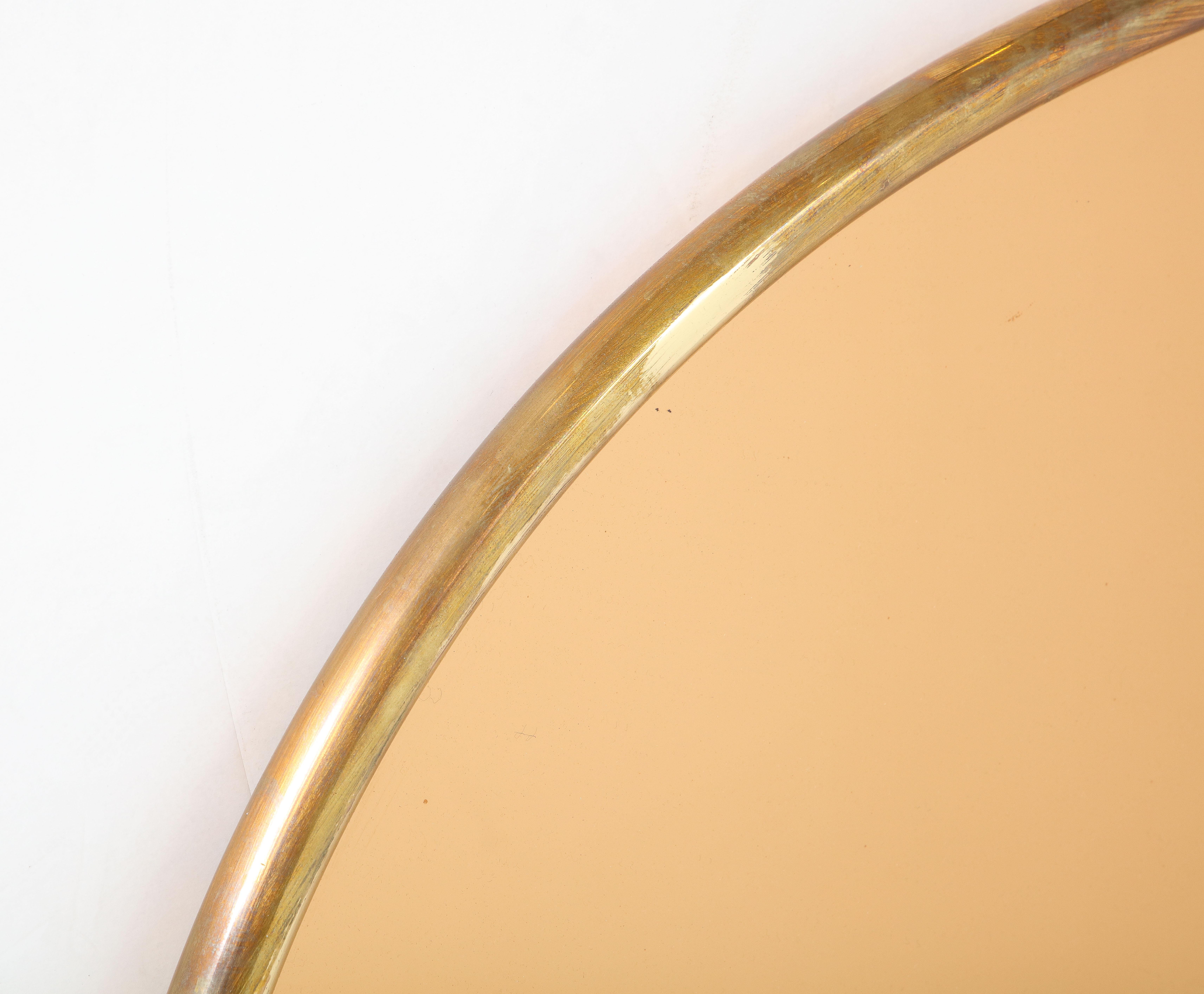 Lacquered 1970s Italian Large Oval Brass Rose Gold Mirror For Sale