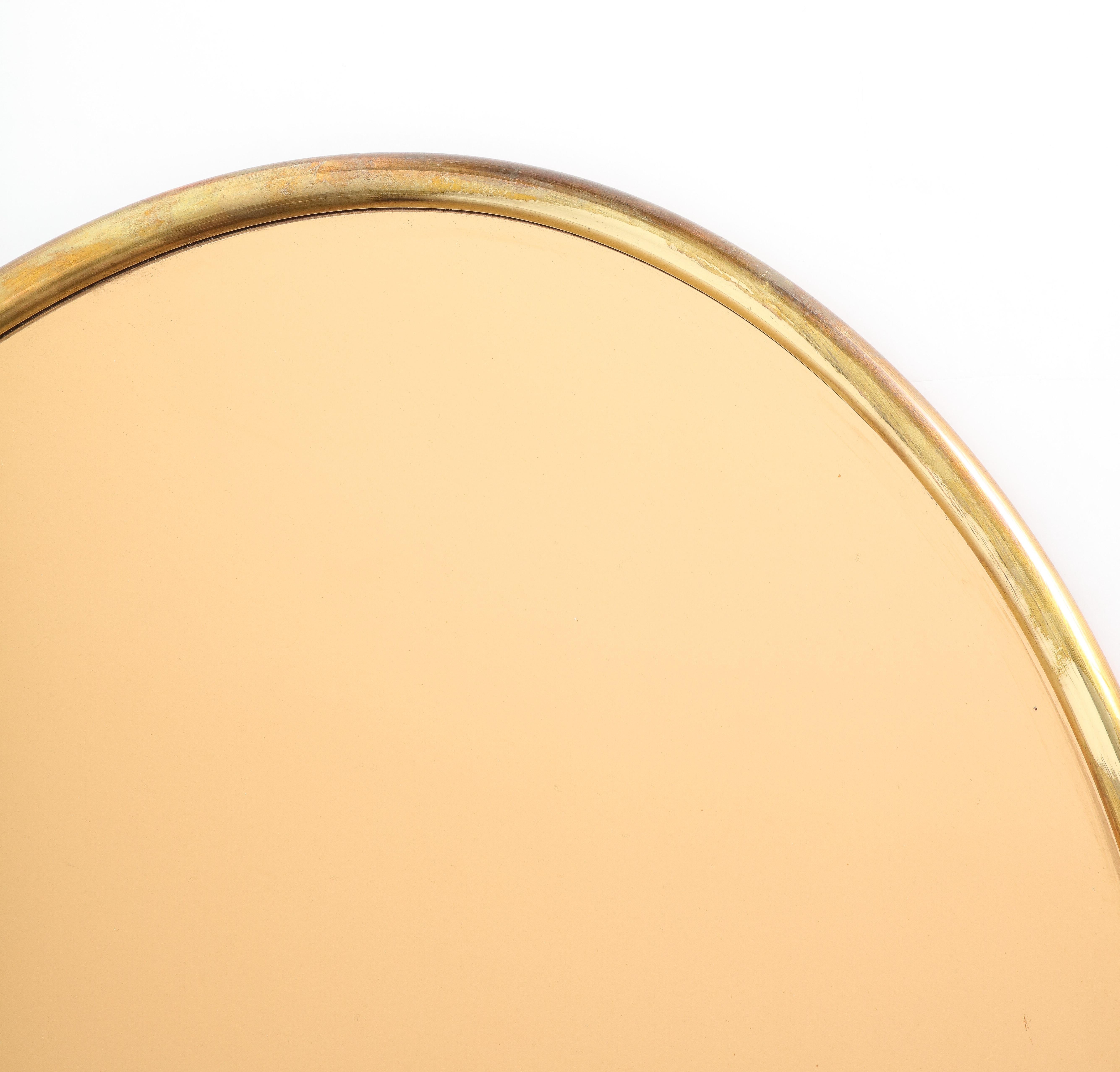 1970s Italian Large Oval Brass Rose Gold Mirror In Good Condition For Sale In New York, NY