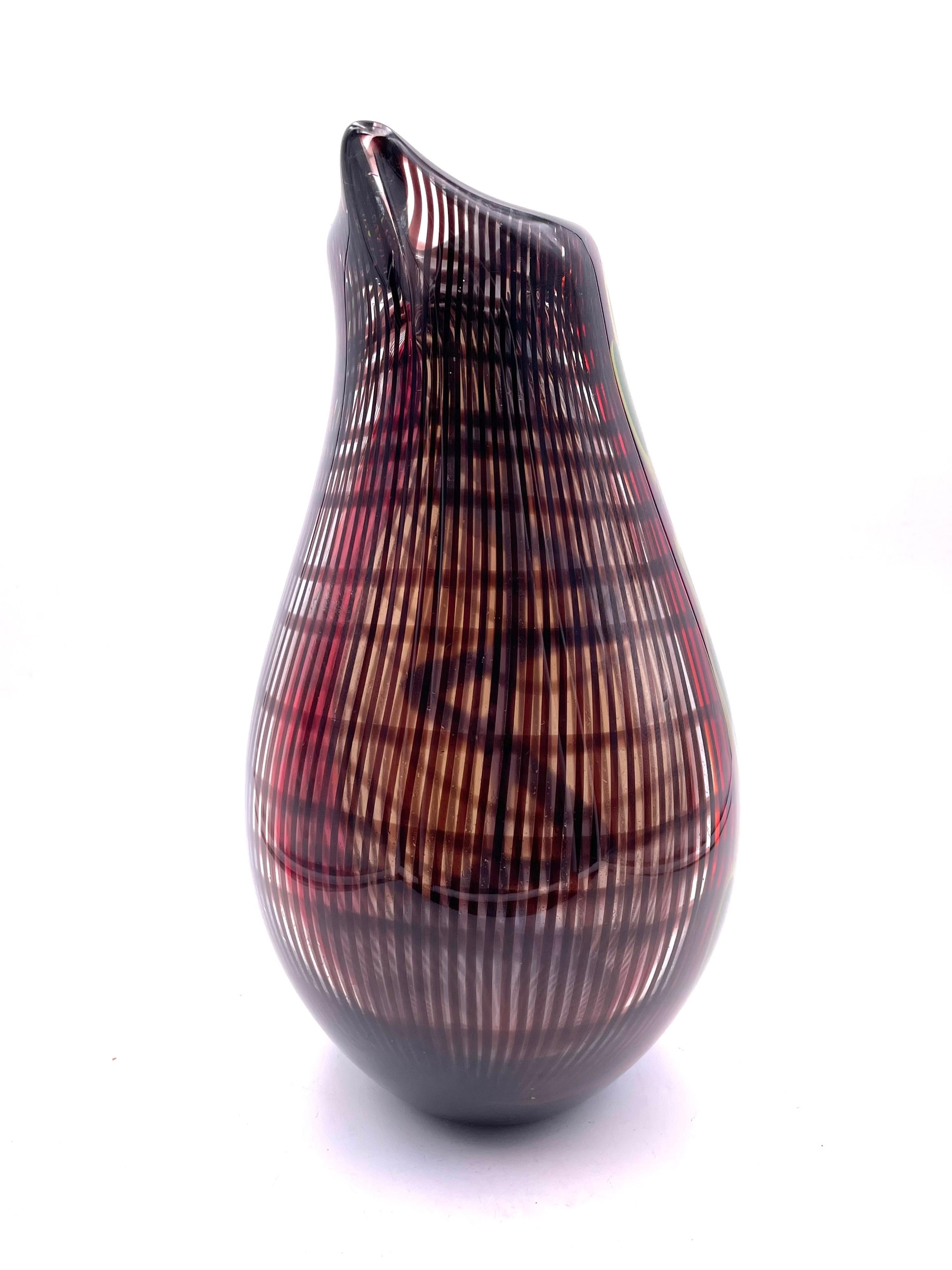 Beautiful and rare vase by Flavio Poli for Seguso, Murano, Sommerso organic glass vase. Vibrant colors on this incredible piece with a twisted swirl accent, at the bottom in red and blue, with a green, yellow, red combo. No chips or cracks.

 