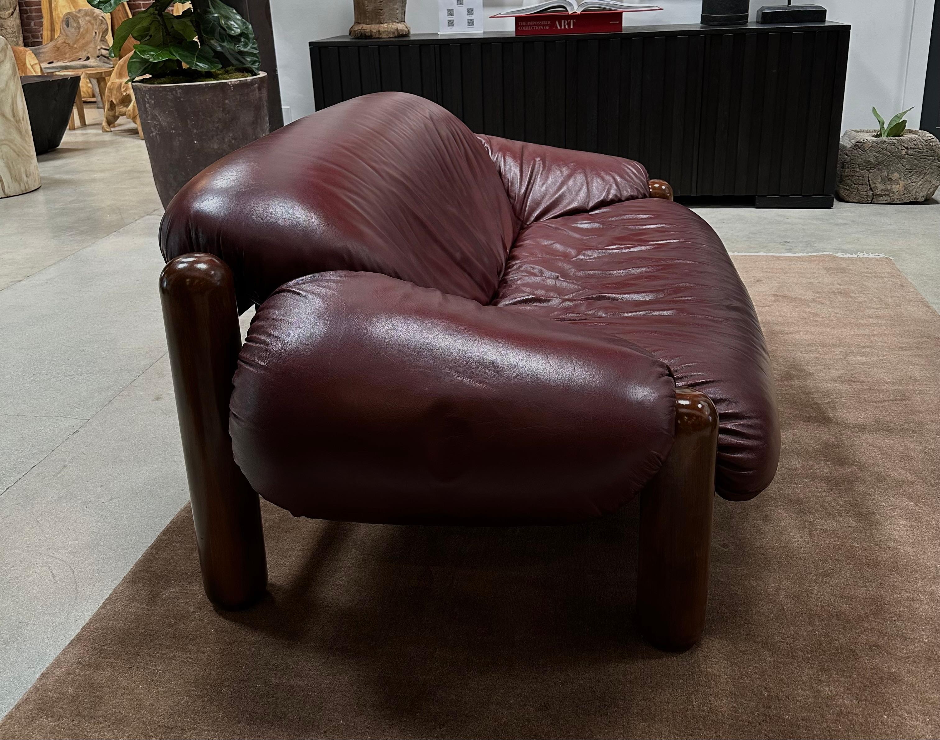 Vintage Italian Leather Loveseat
Burgundy leather. Wood frame. Italy, 1970s.
Overall Dimensions: 72