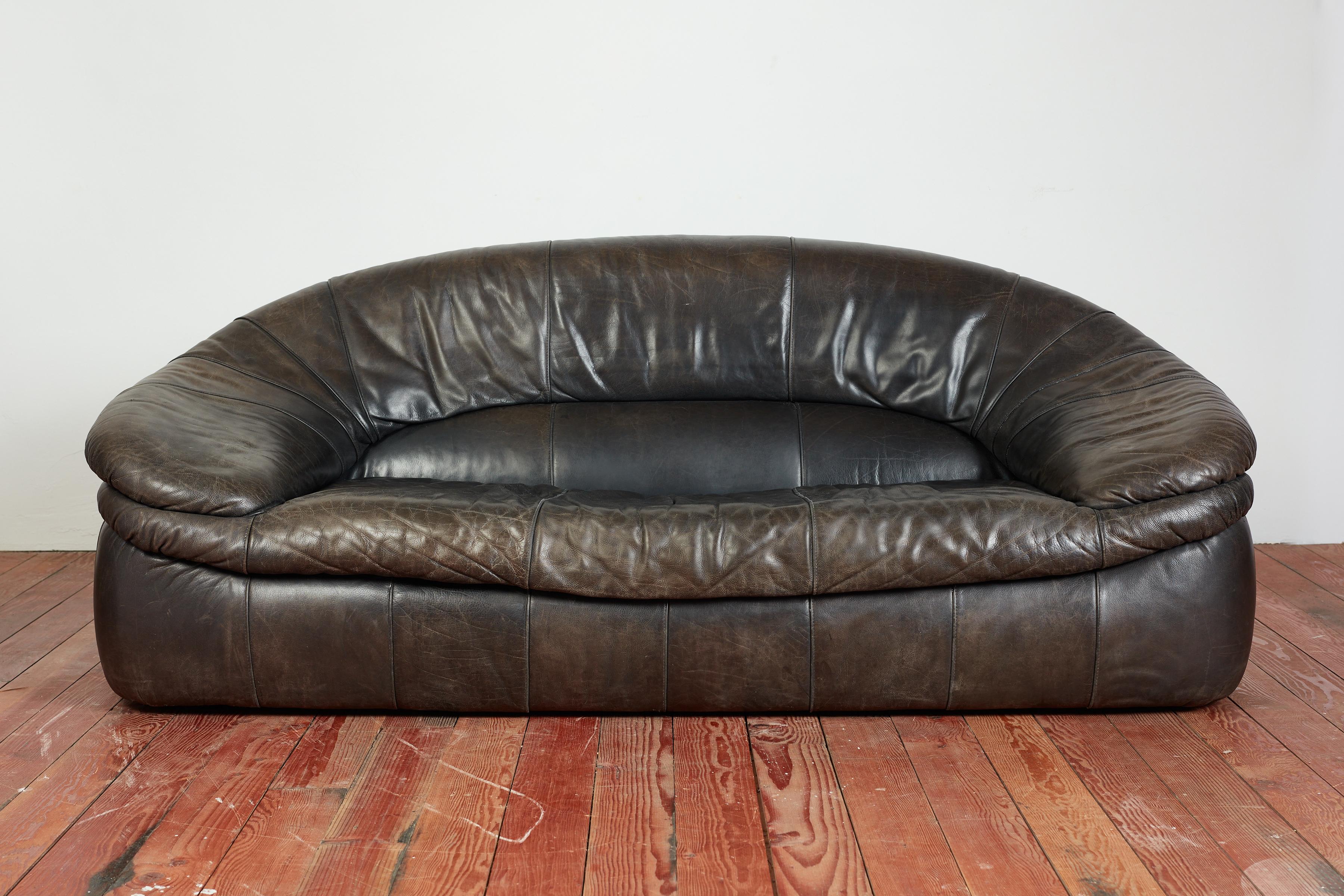 1970's Italian leather sofa with wonderful shape and patina 
