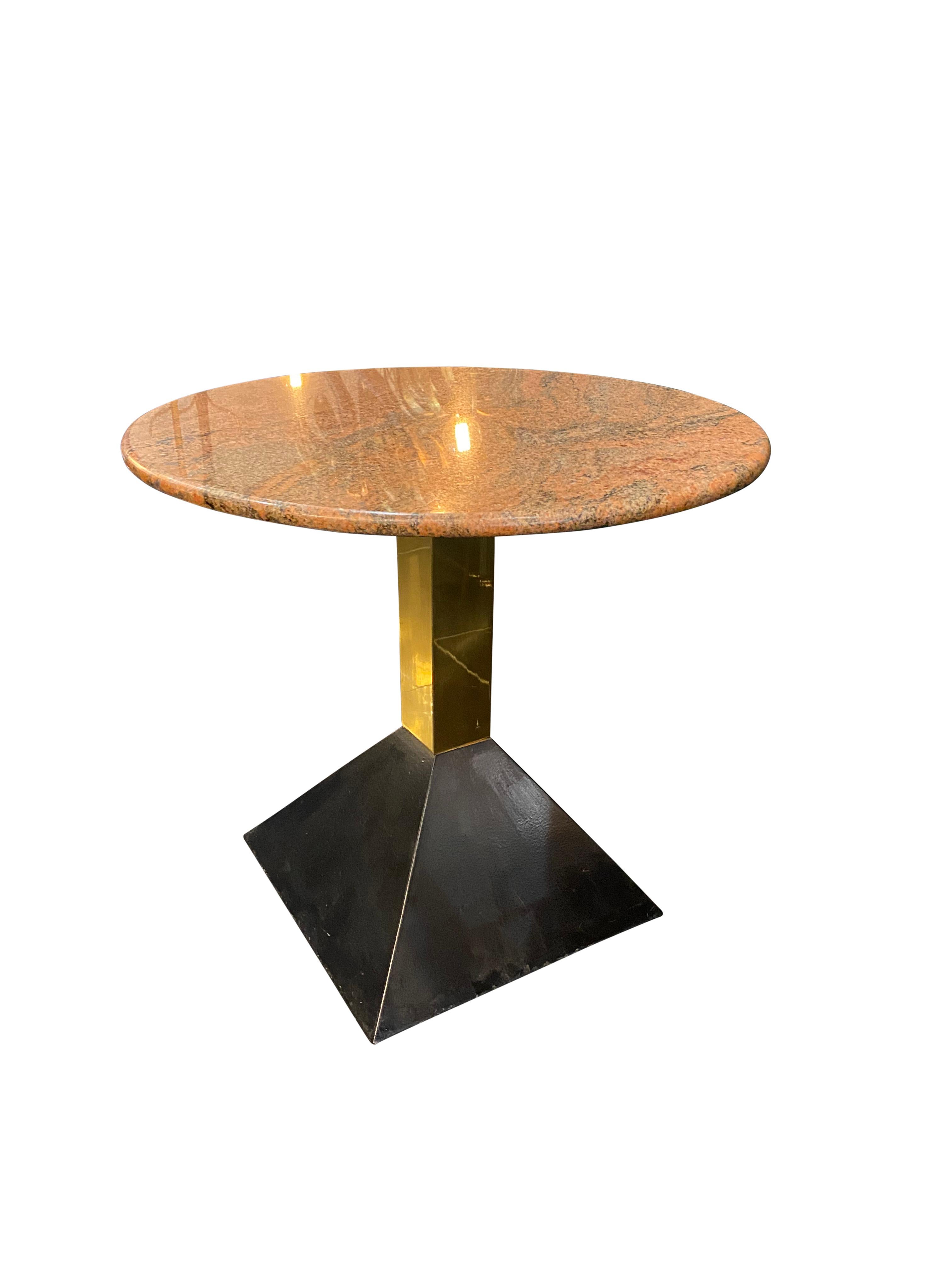 Italian cocktail tables with alternate marble tops in grey or red; standing on brass and black cast iron base.
£1500 each.

 