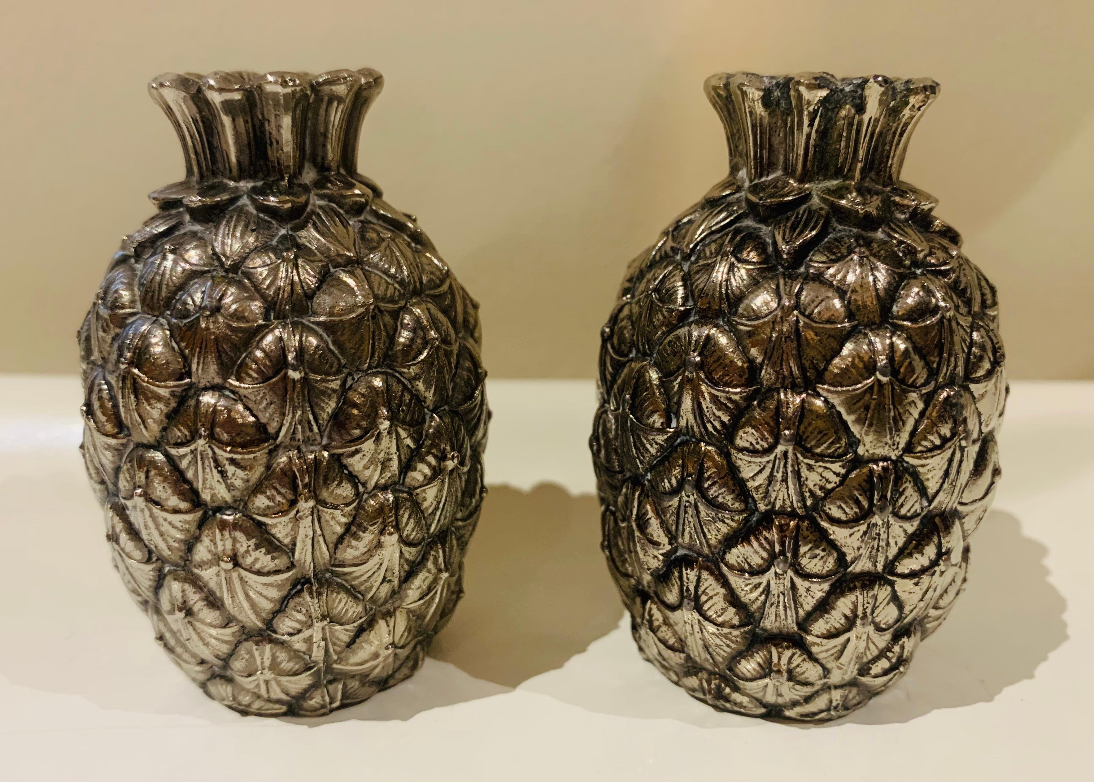 1970s Italian silver pineapple shaped salt and pepper shakers designed by Mauro Manetti in Firenze. Manetti is well known for his highly decorative sculptural barware and tableware in different forms such as ducks, owls, acorns in both gold and