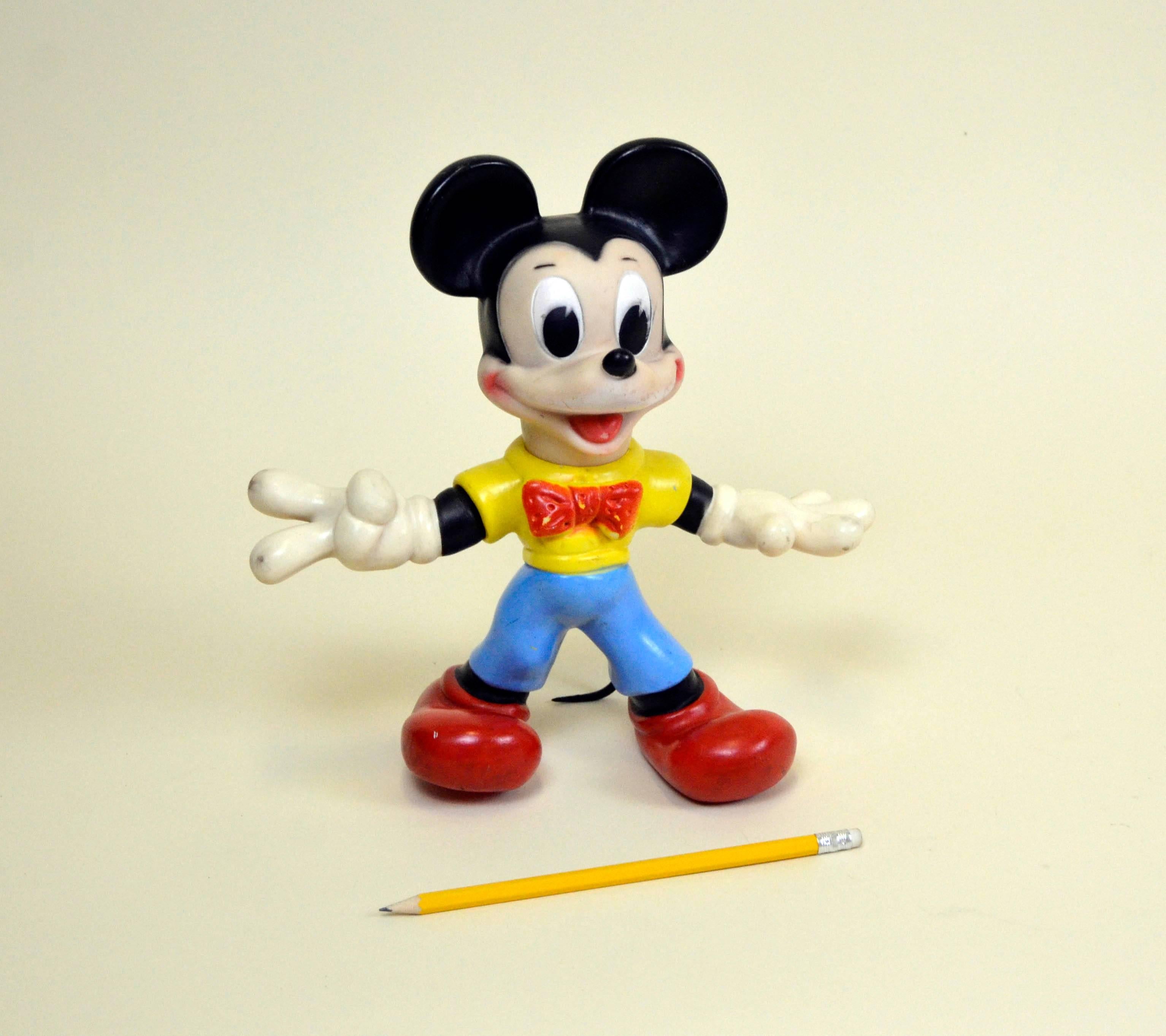Vintage Mickey Mouse whistling rubber toy with movable arms and tail made by Ledraplastic Italy in the 1970s.

Marked Walt Disney Production on the back and stamped with Ledraplastic elephant symbol.

Collector's note:

In 1962, the company