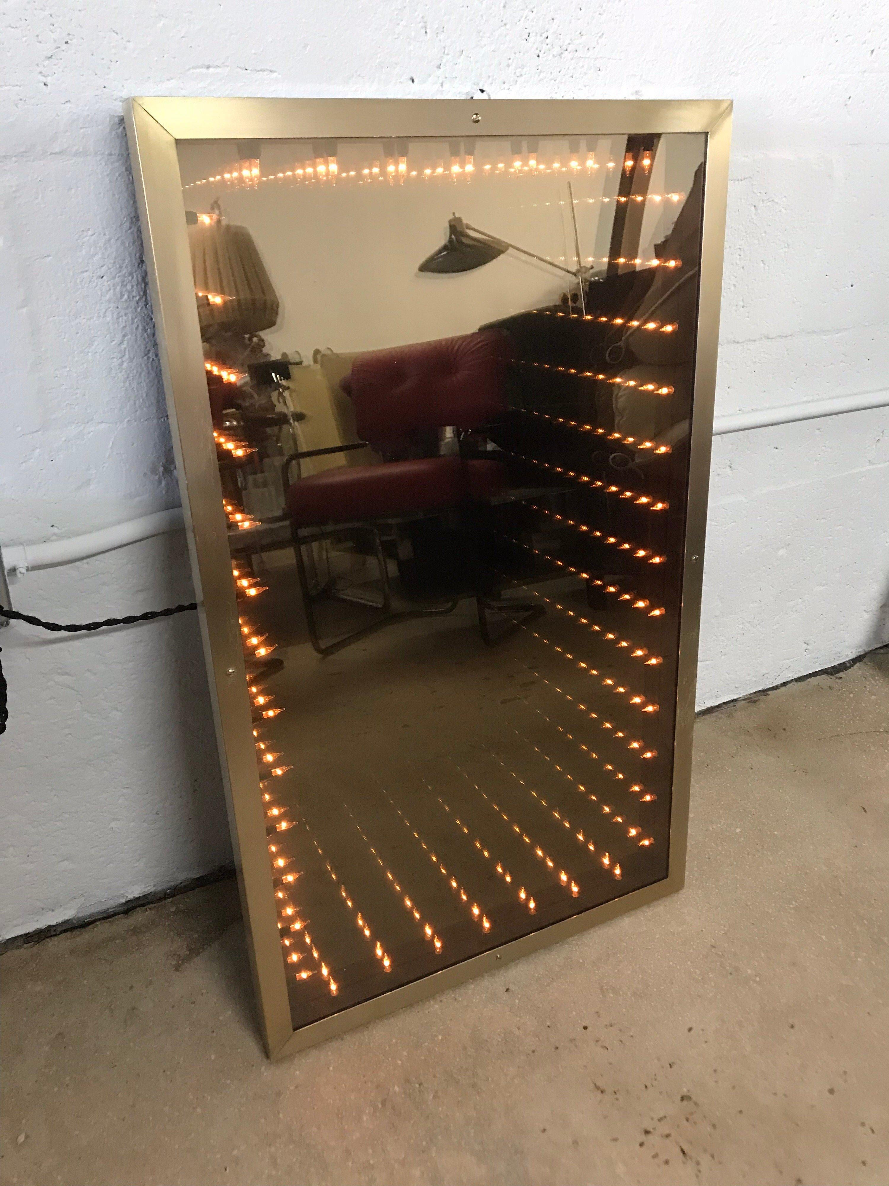 Brass framed infinity mirror, Italy.