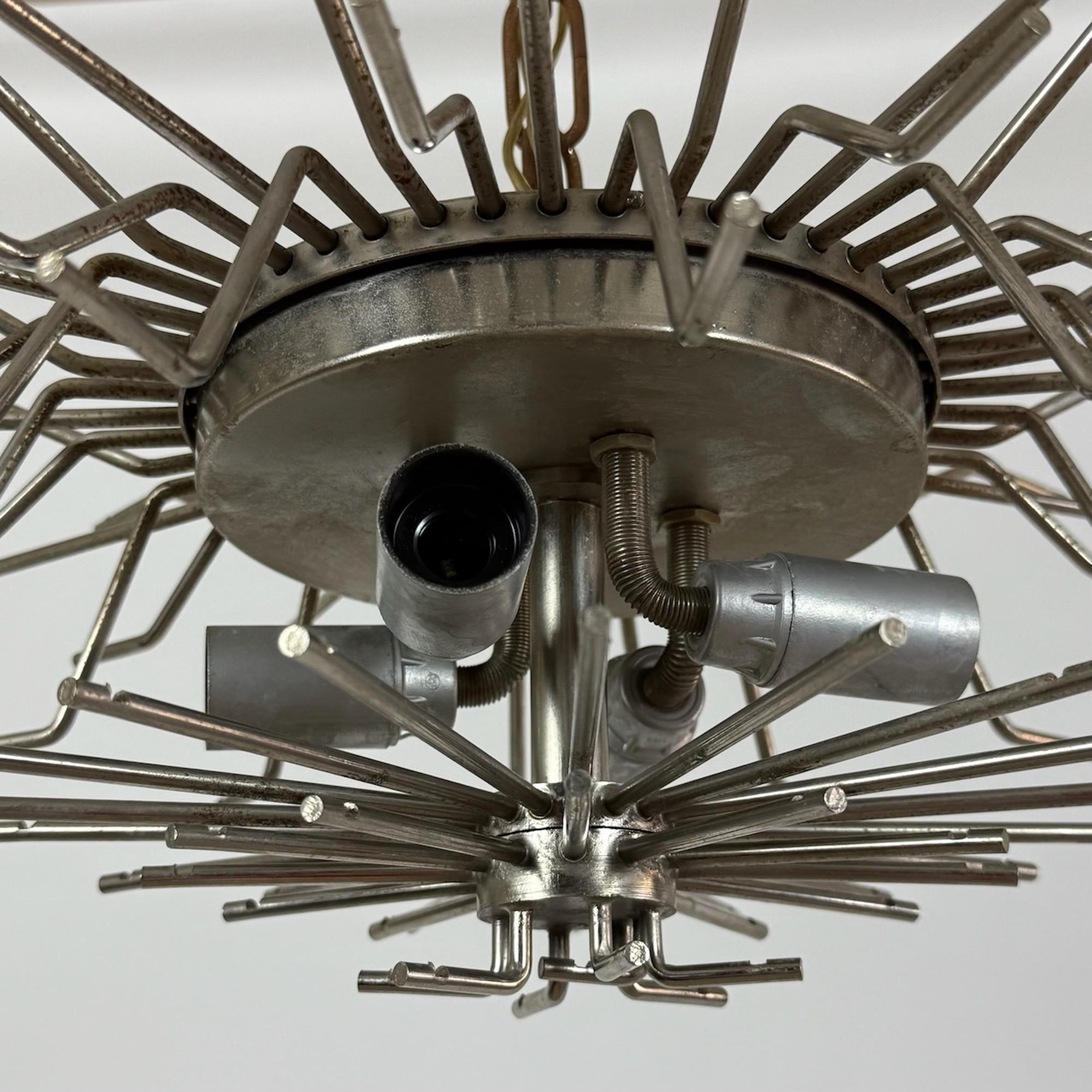 Hollywood Regency 1970s Italian Murano Chandelier with Trilobal Glass Prisms and Chrome Frame in vendita