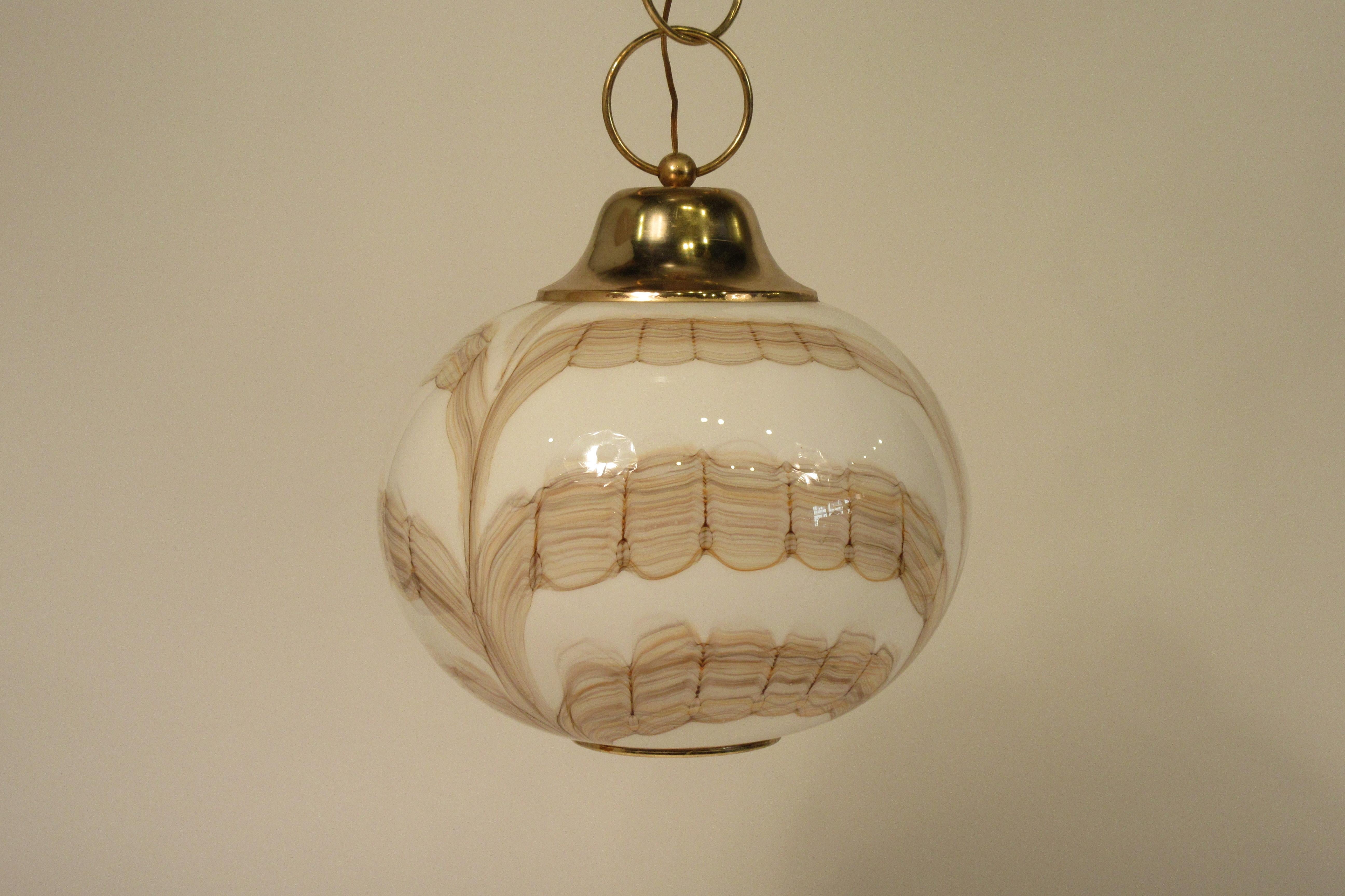 1970s Italian Murano glass ball fixture, with brass accents. Some wear to brass.
Each ring is 4.25”.