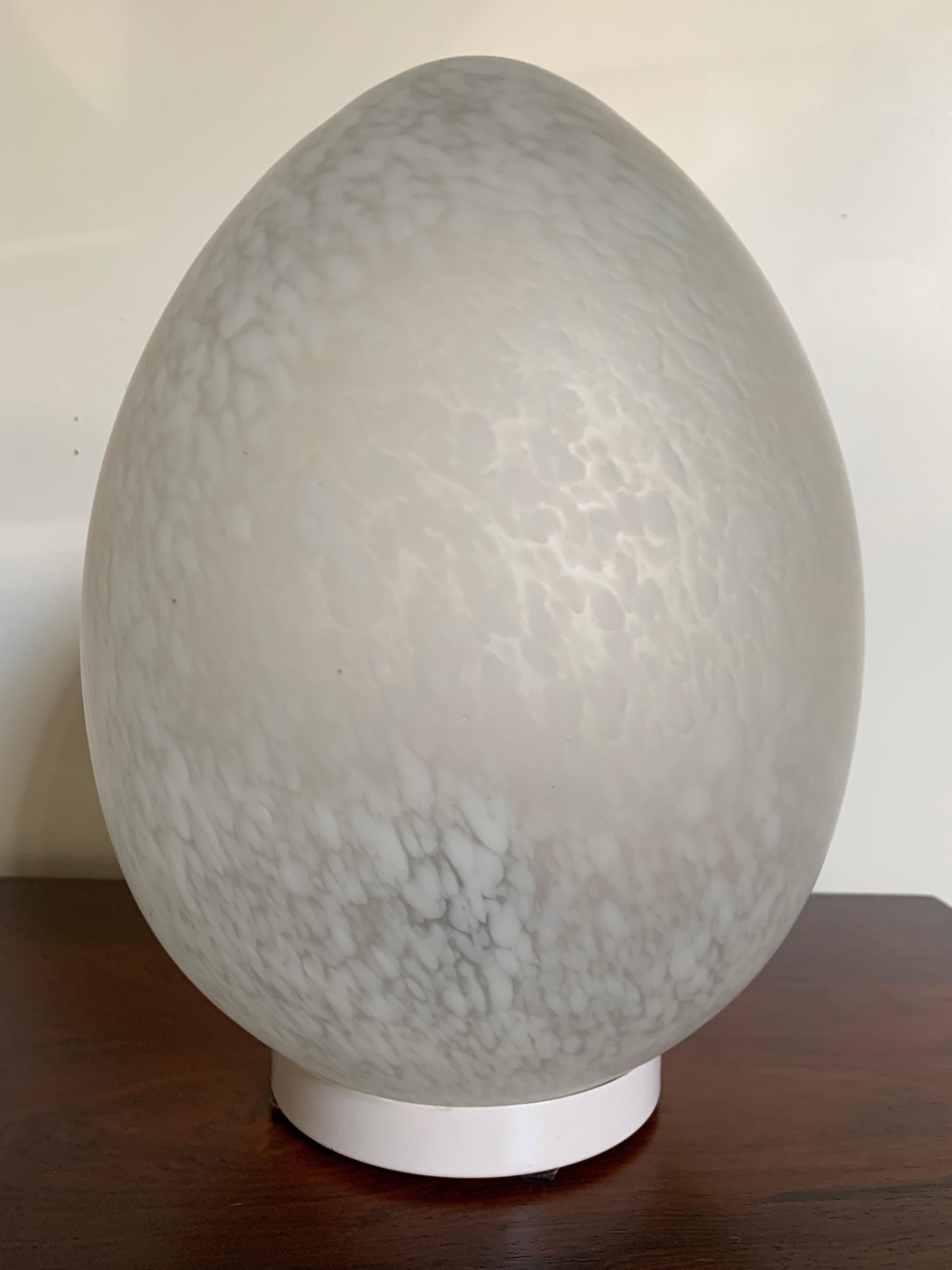 A white mottled glass and metal egg shaped lamp, Italian, circa 1970s made in Murano Italy.