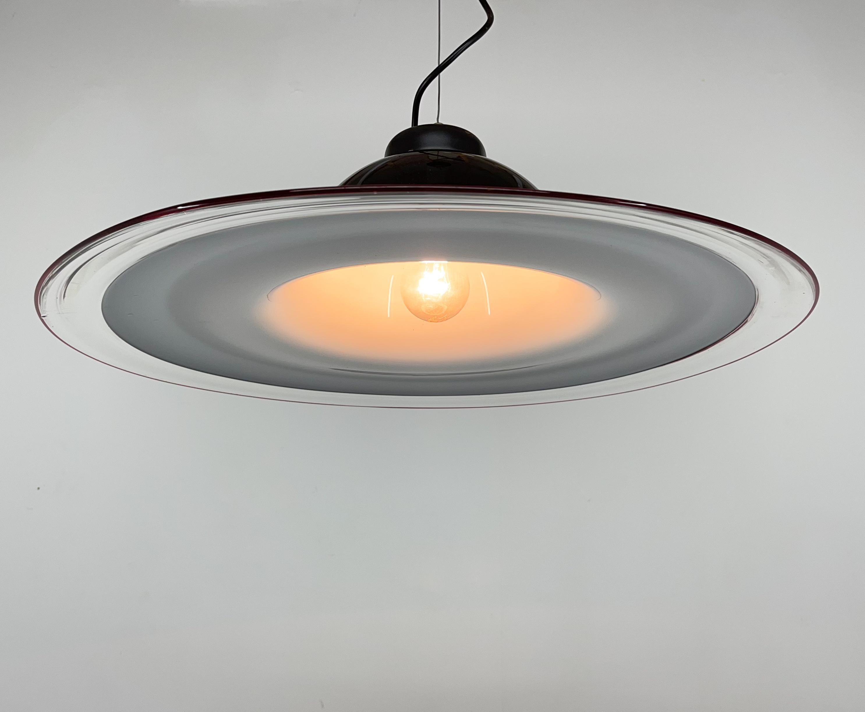 Vintage pendant light produced in Italy in the 1970's. 
Elegant piece of lighting.