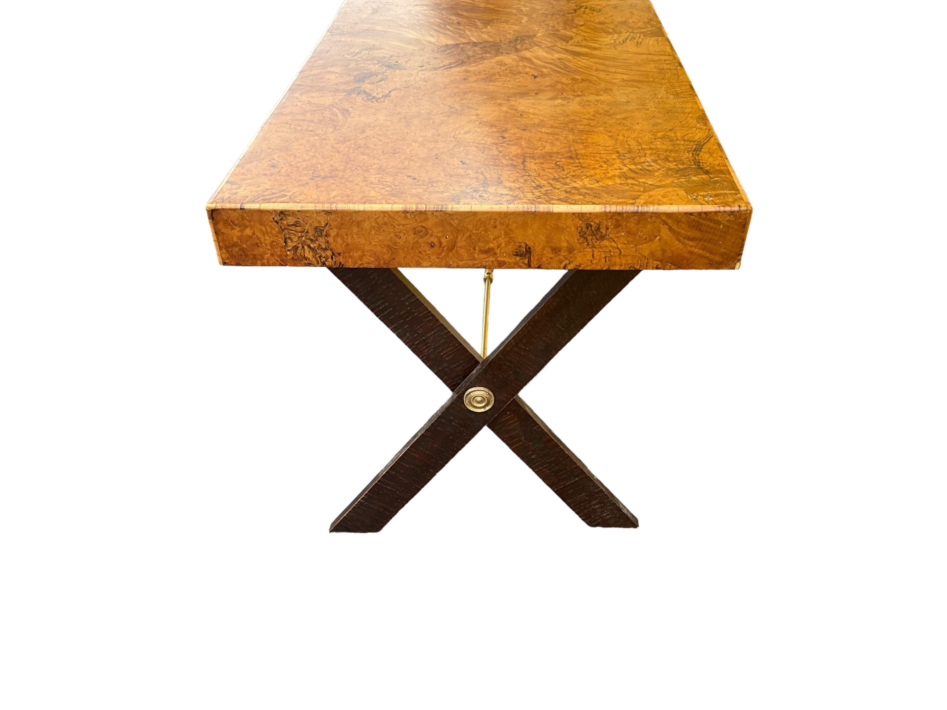This is a 1970s Neoclassical style Italian burl desk with ebonized x-base. The burl is beautiful, and it is finished on all sides. The cross stretcher is brass. The piece is unmarked. 

My shipping is running two to five weeks, and it is for the
