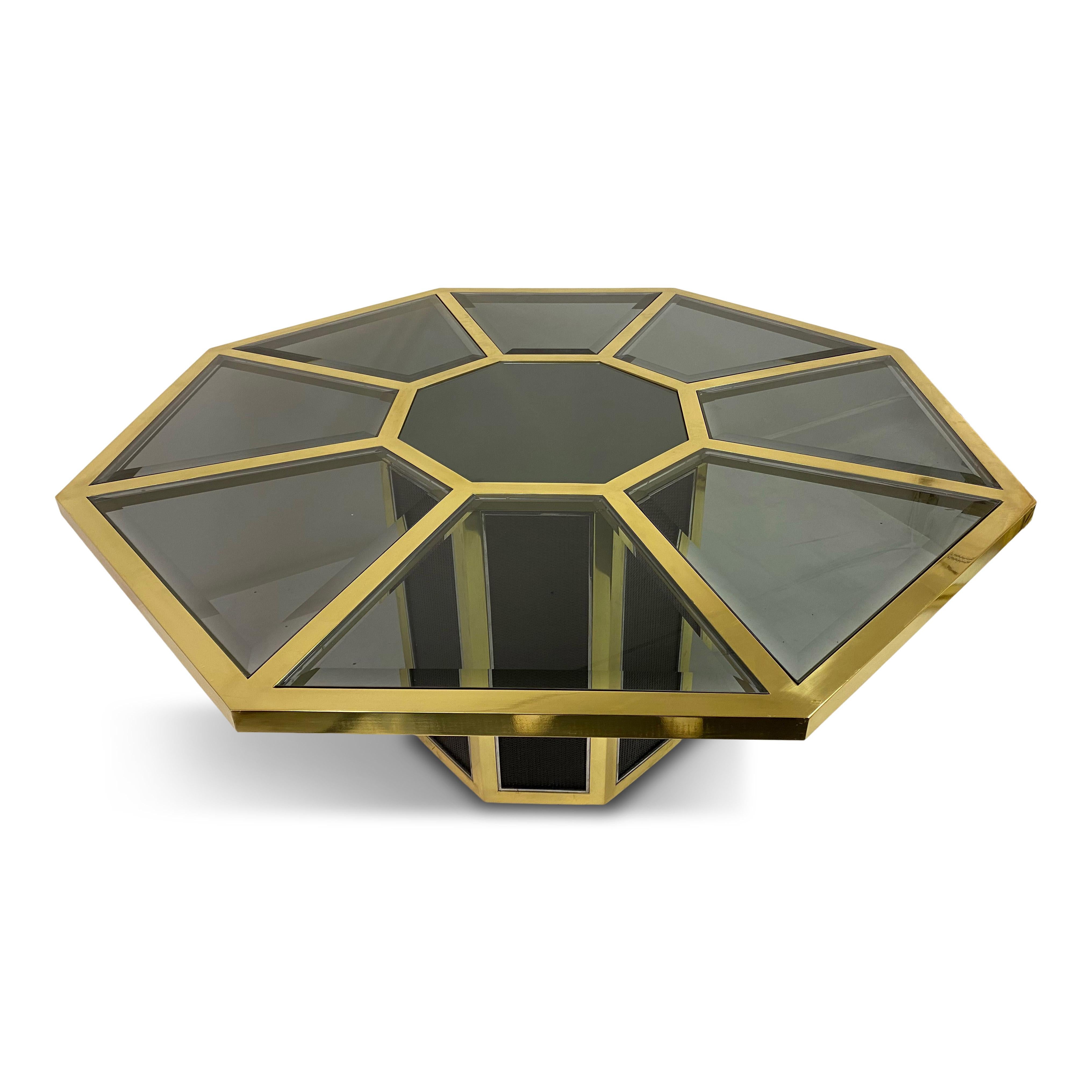 Opazio octagonal dining table

By Romeo Rega for Sabot.

Brass and chrome frame. 

Black rattan. 

Smoked beveled glass 

 Mirrored glass centre. 

Italy, 1970s.