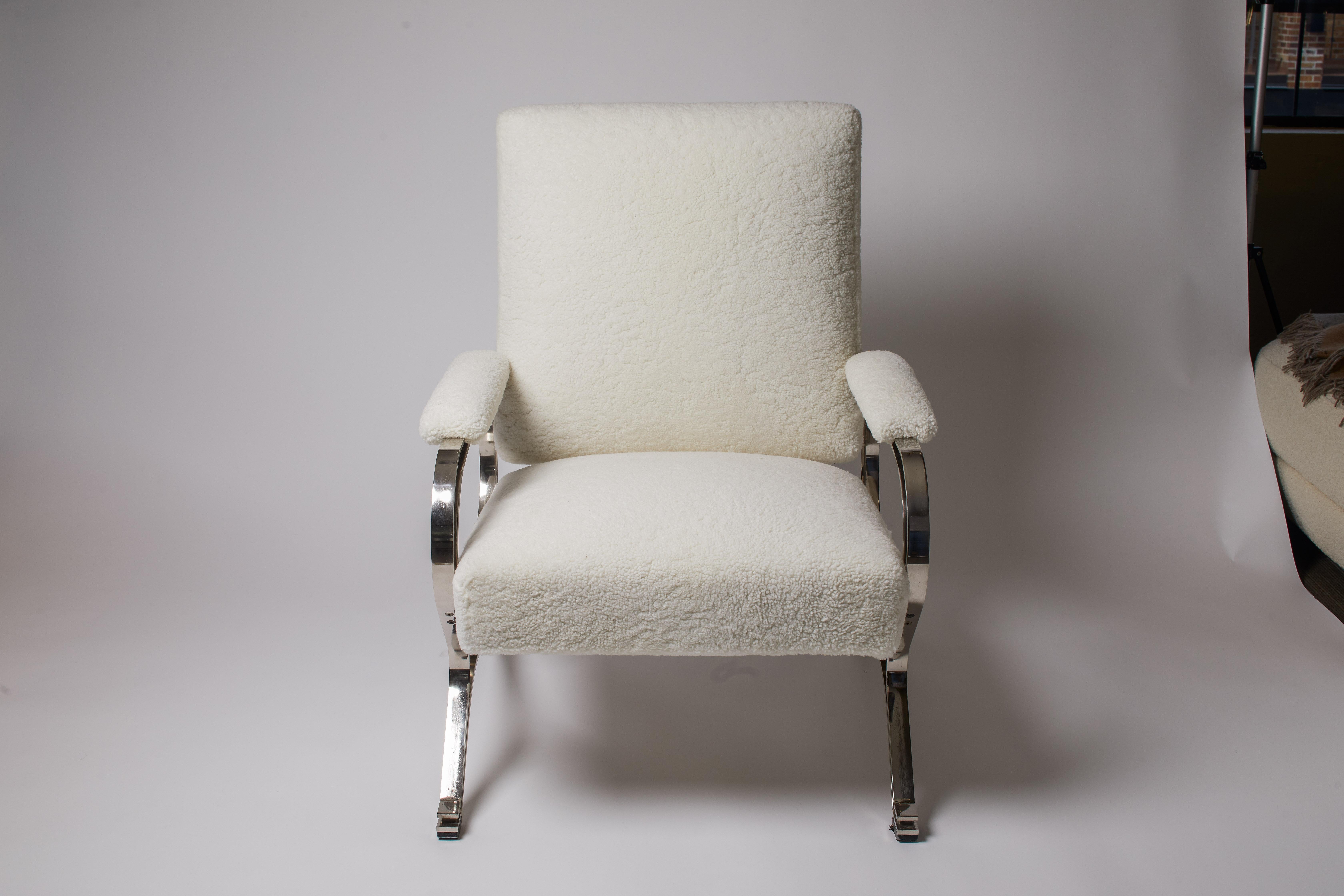 1970s Italian pair of white shearling armchairs with chrome detailing by Gianni Moscatelli.