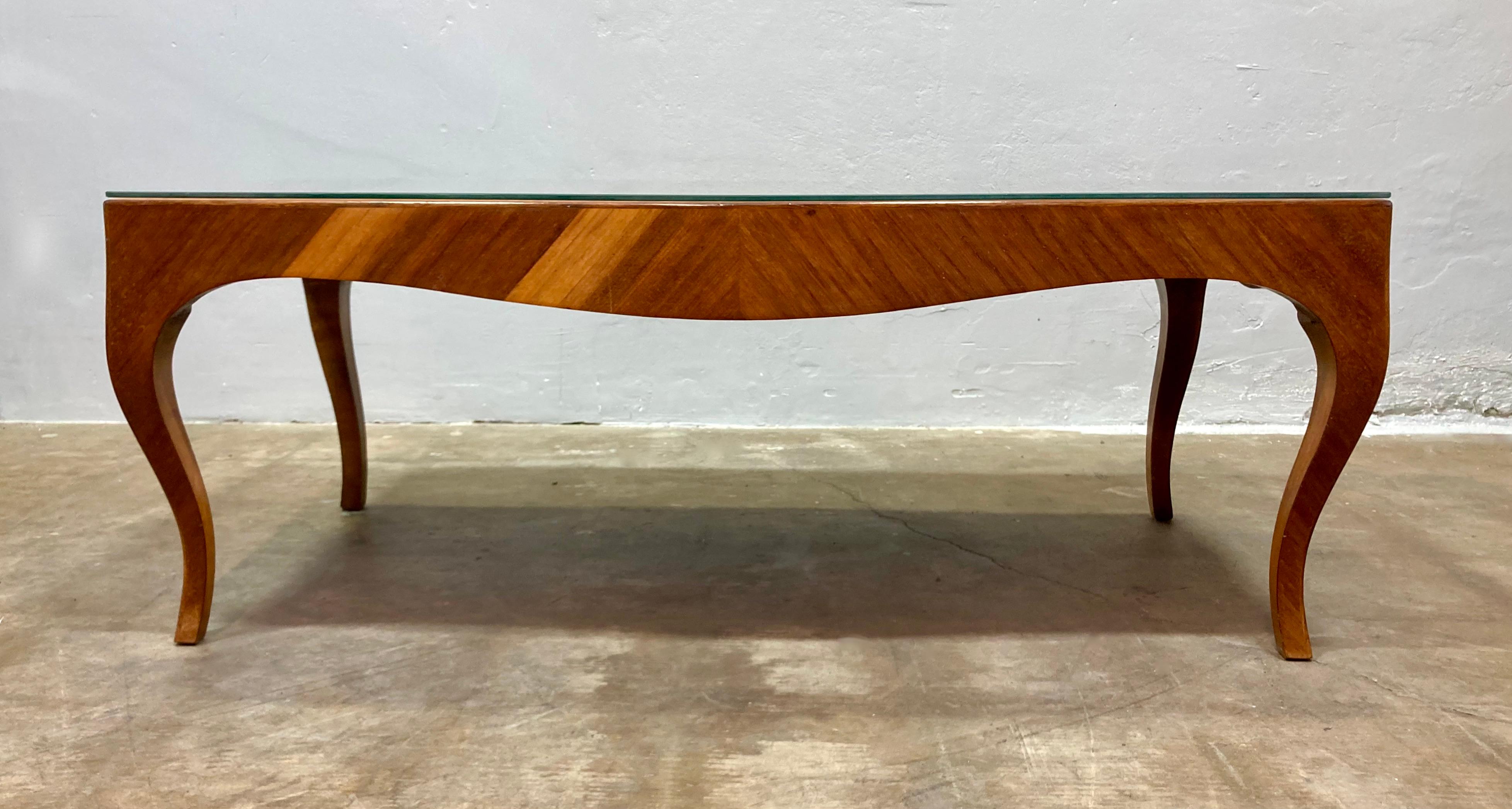 Italian inlaid olive-wood coffee table. Mid-century piece, made in a classical French style. Cut glass top. Wood is in excellent vintage condition, with one scratch on the table top (detail shown in pictures). 

47