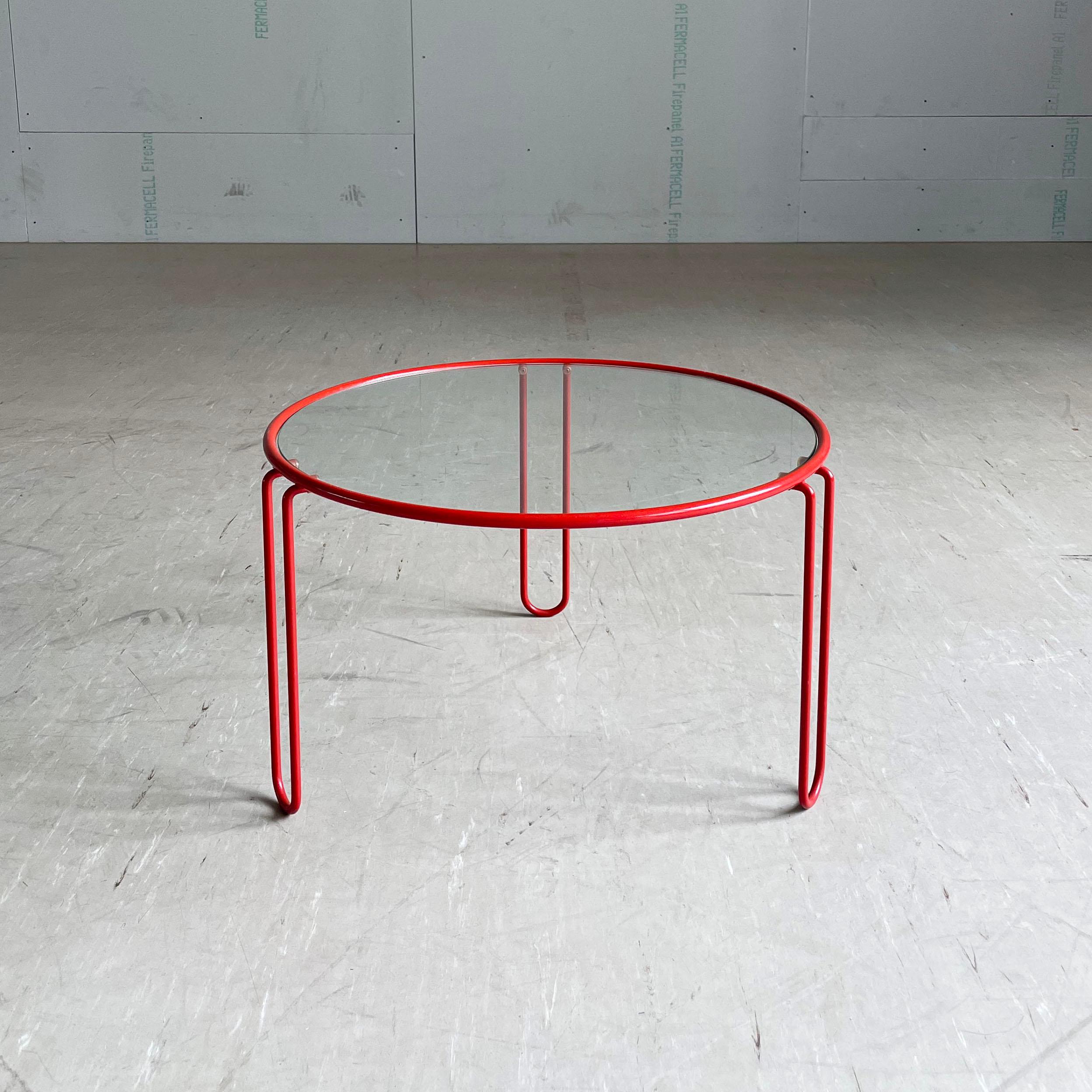 Stylish 1970's Italian Coffee / Side Table. Red metal frame with clear glass tabletop. 