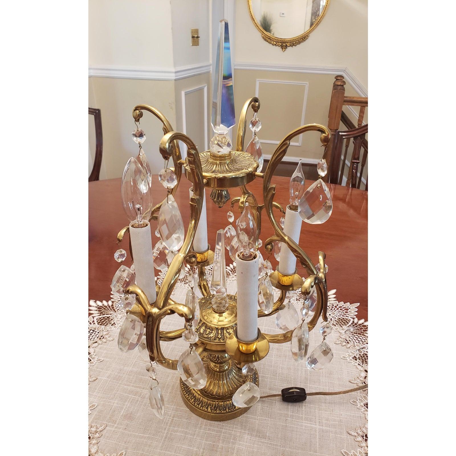 Italian vintage solid brass and crystal table chandelier. Crystals are slightly over an inch wide and about 2inches tall. Solid brass base is 5 inches in diameter. The piece is 11