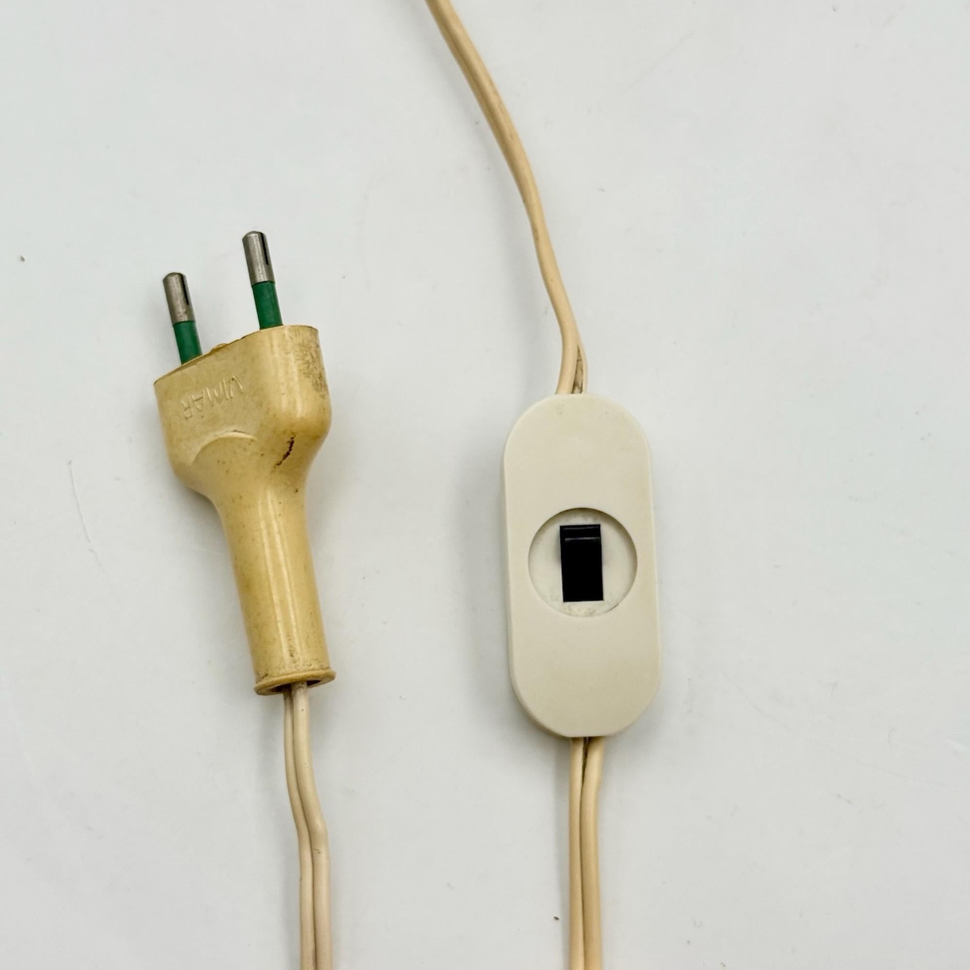 Created in Italy in the early 1970s, this Toucan table lamp by Enea Ferrari for Old Timer Ferrari is an important example of the playful wave of Space Age design that emerged across Europe at the time. Crafted in moulded plastic—a material central