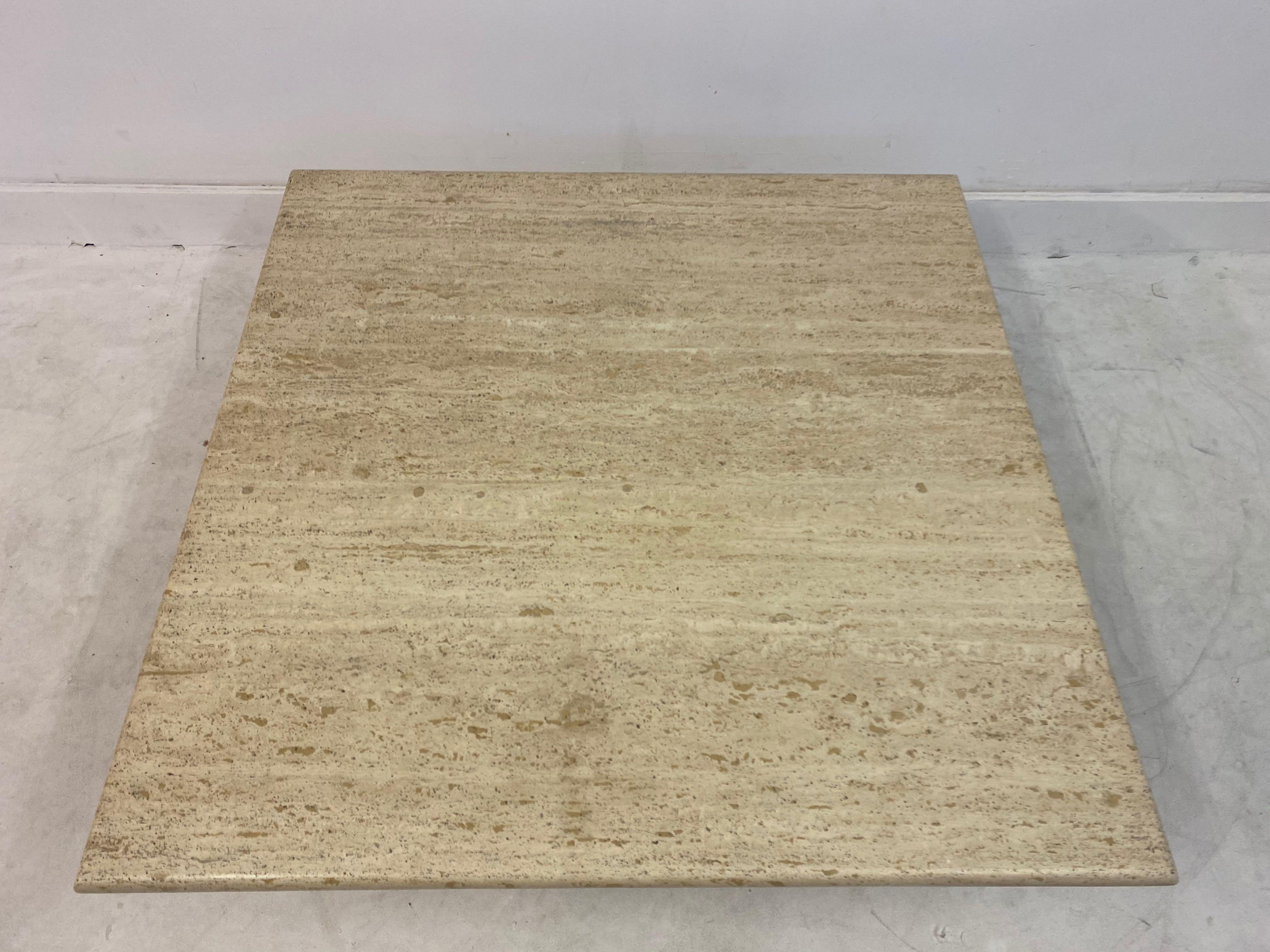 Travertine coffee table

Square

Cube base

Simple natural look

1970s, Italy.