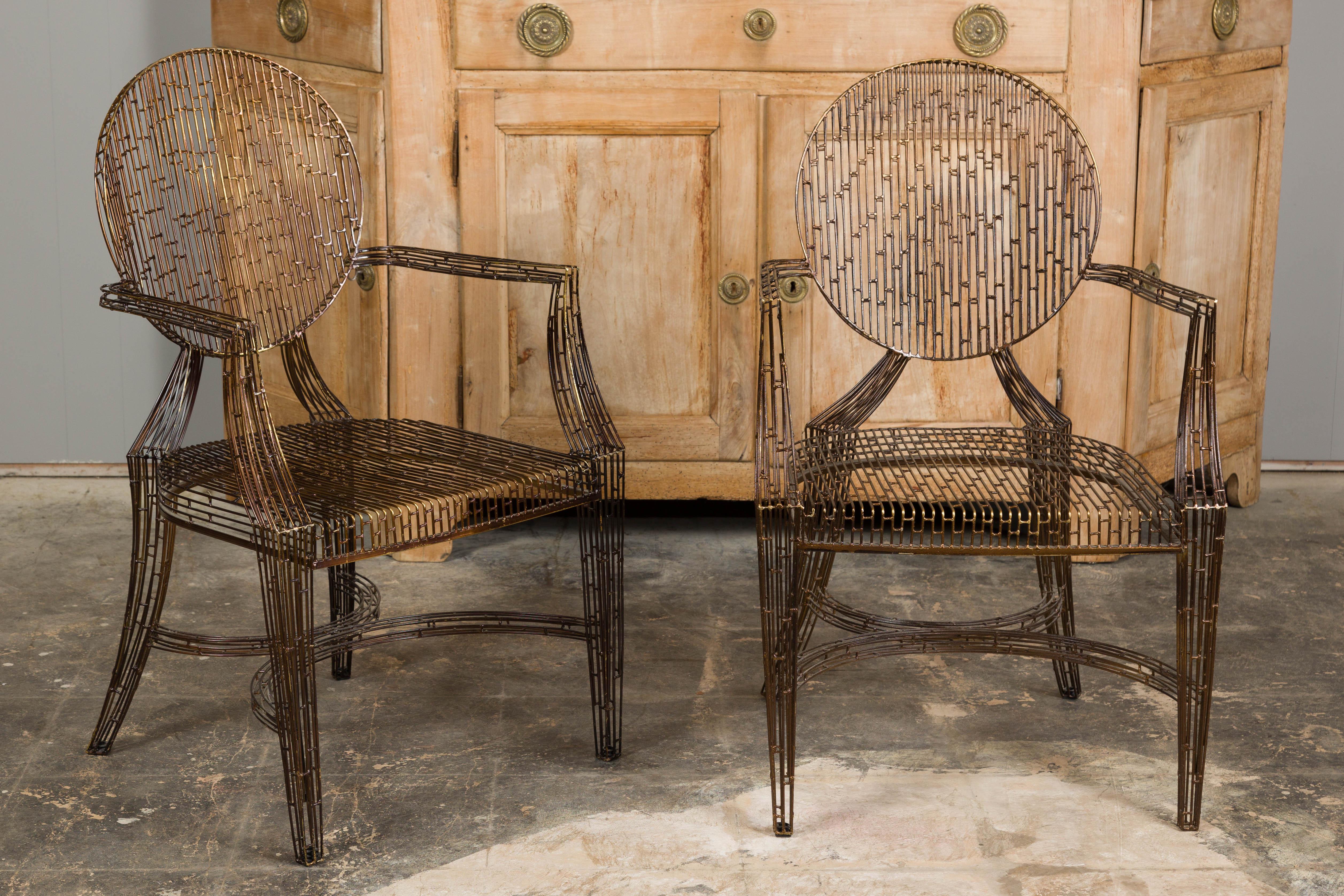 A set of four Italian vintage steel patio or garden chairs from circa 1970 with round backs, slightly splaying arms and tapering legs. Feast your eyes on this enthralling set of four vintage Italian patio chairs, an authentic expression of vintage